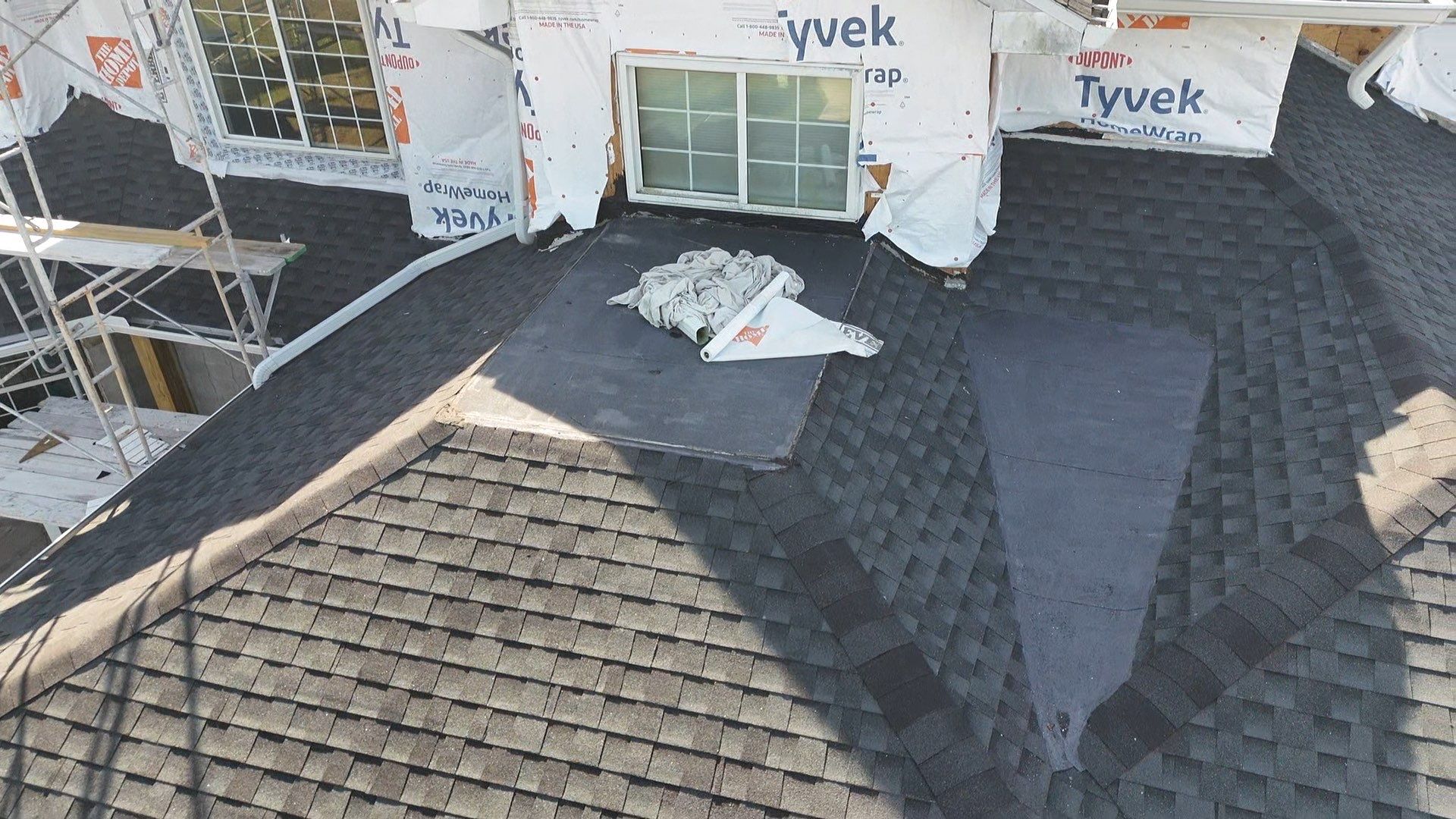 Shingle roof repair by Durabilis Roofing INC