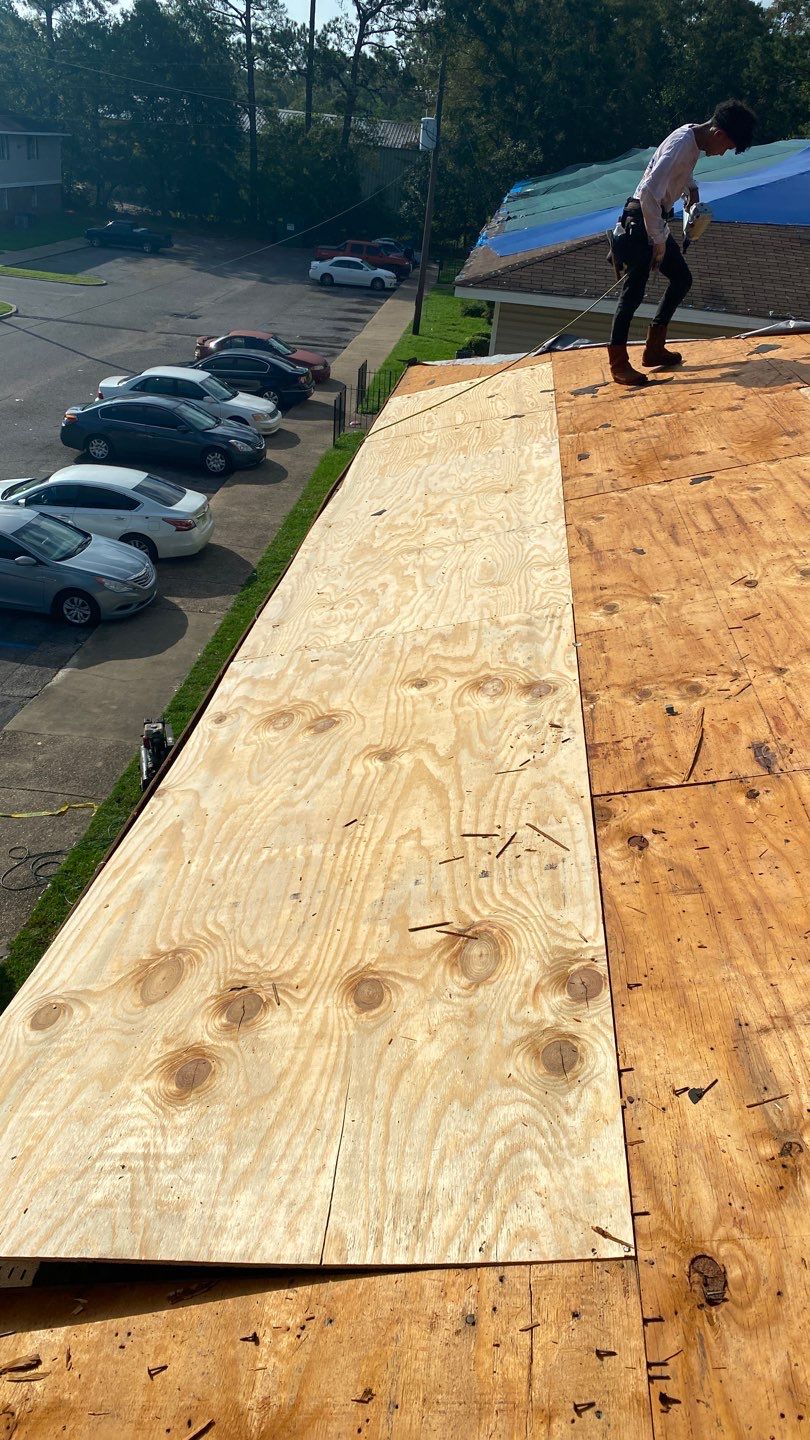Commercial Roofing Installation using Roof Replacement by American Roofing & Construction LLC