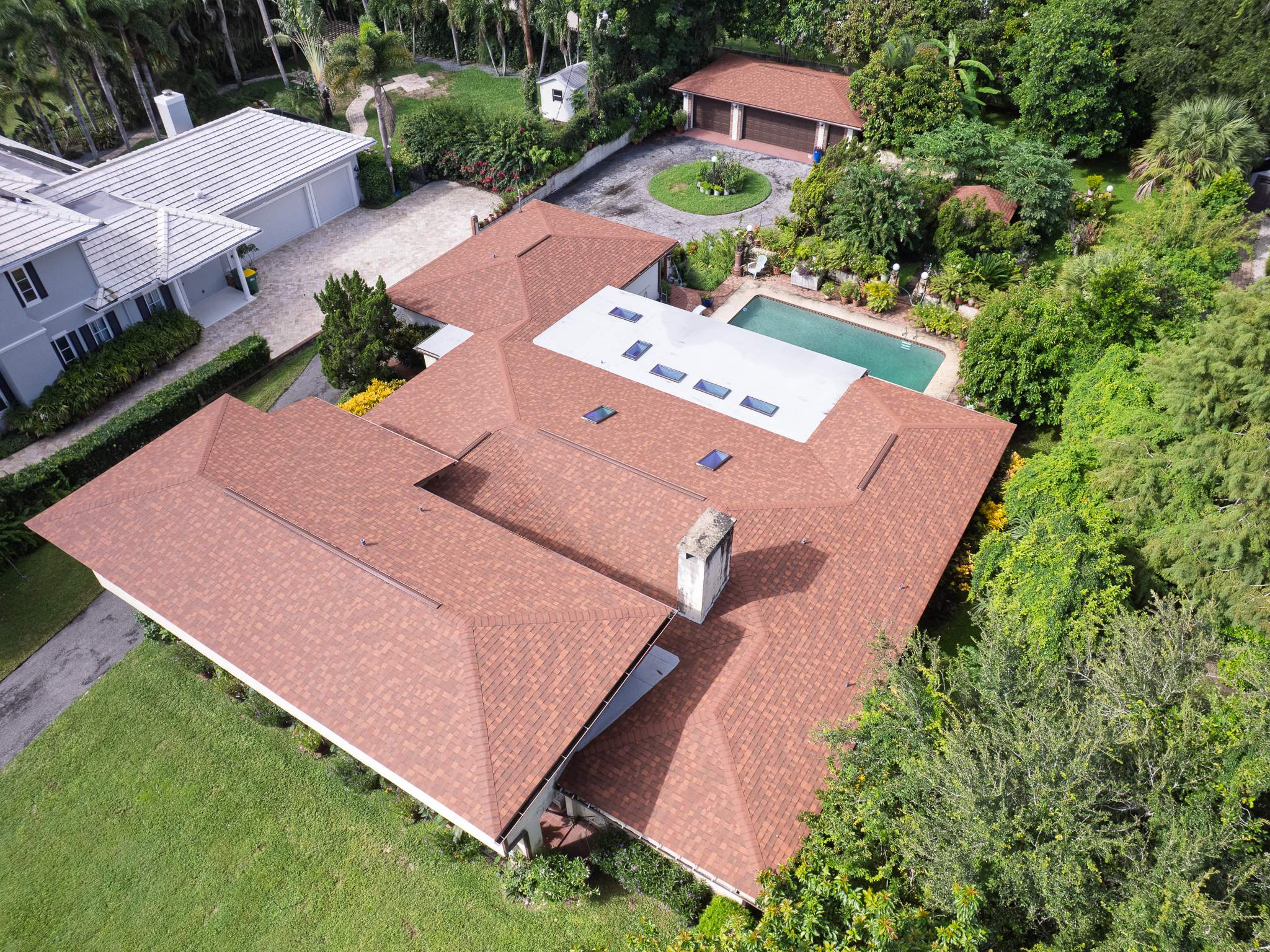 Cocoa Residential Roof Replacement Featuring Integrated Skylights and Flat Roofing by Wiedmann Construction & Roofing
