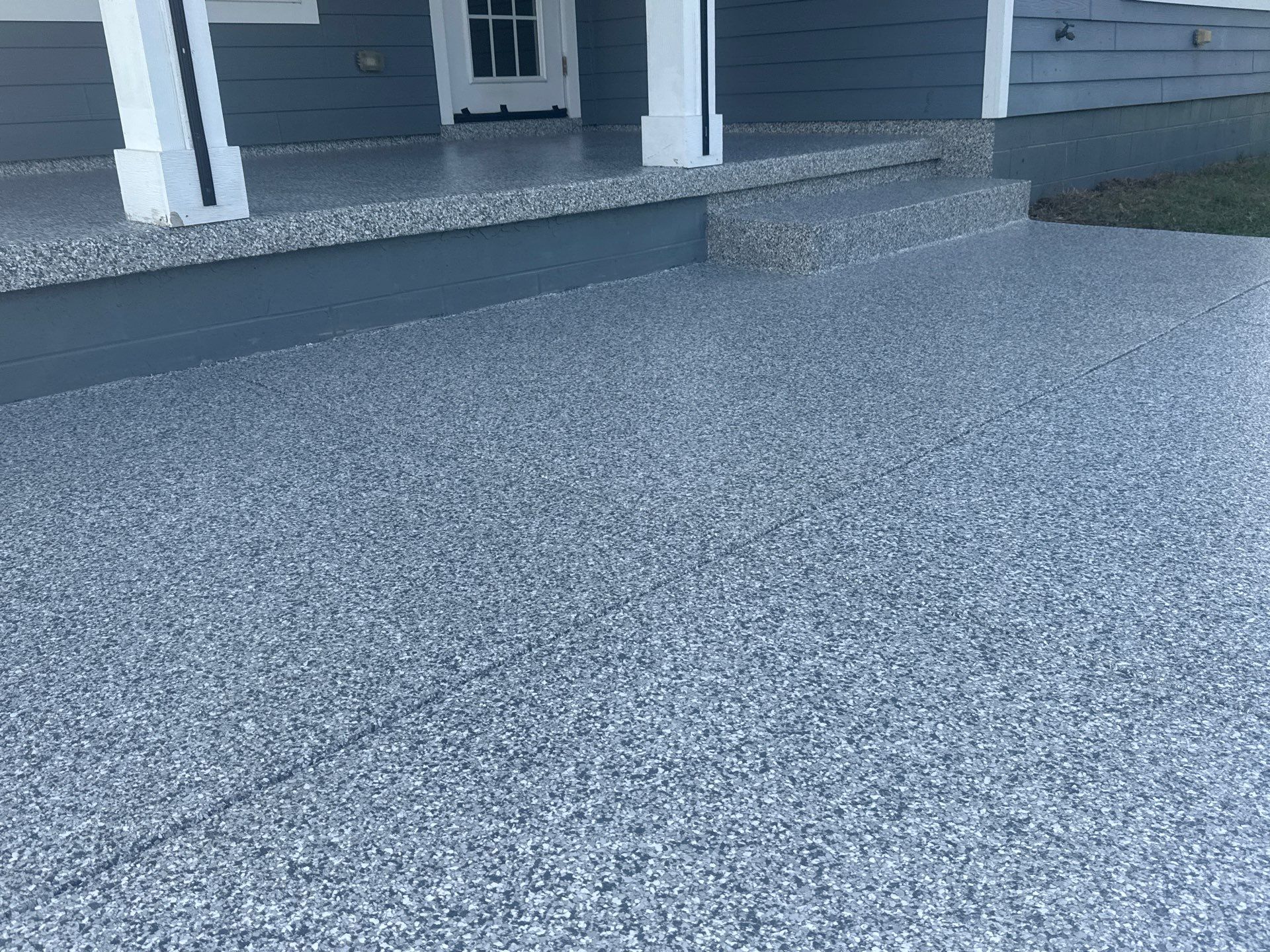 Back Patio in Slate Stone by Cross Creek Concrete Coatings