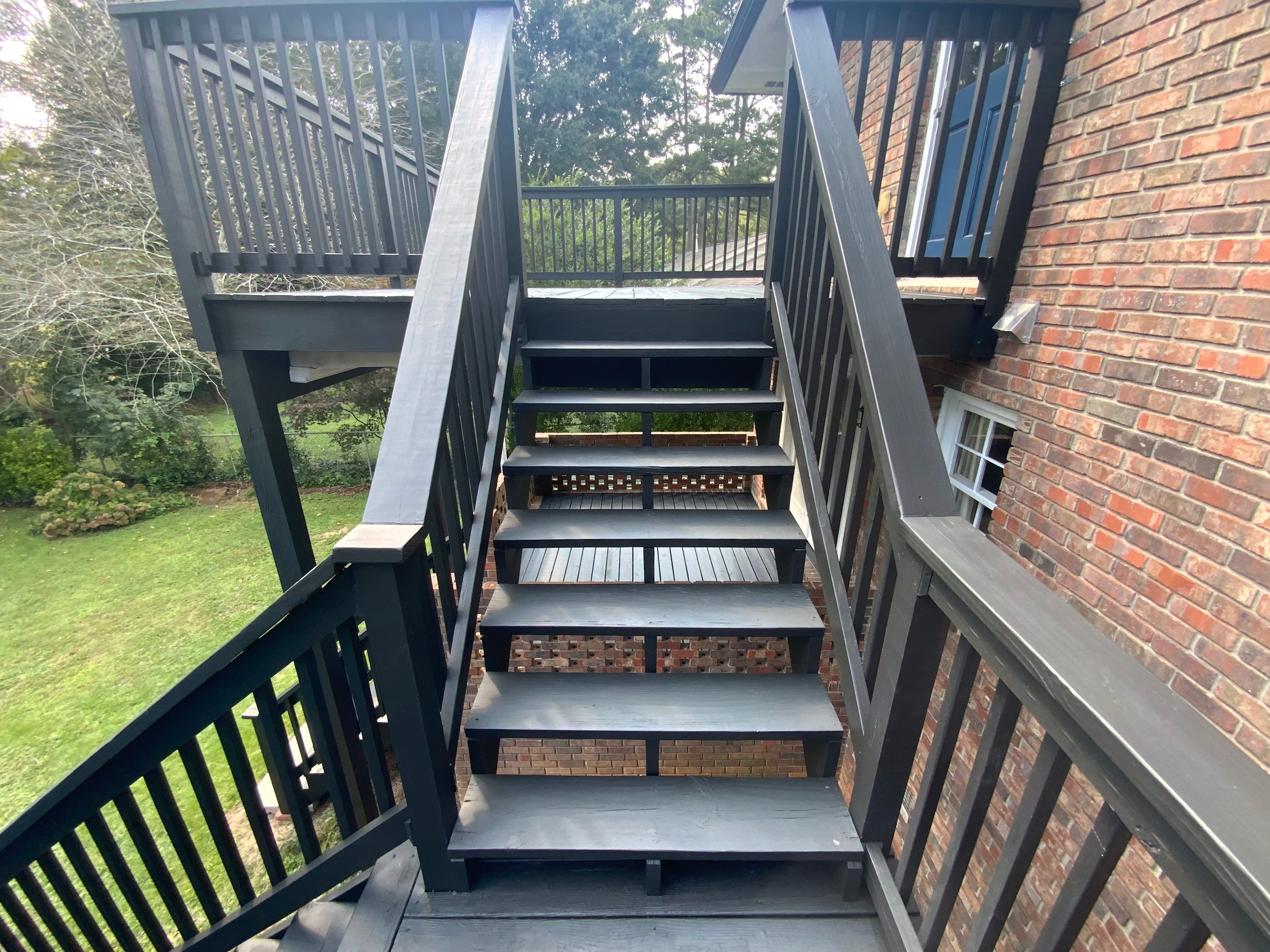 Full Exterior Trim Painting and Multi-Level Deck Staining by Swift Home Renovations