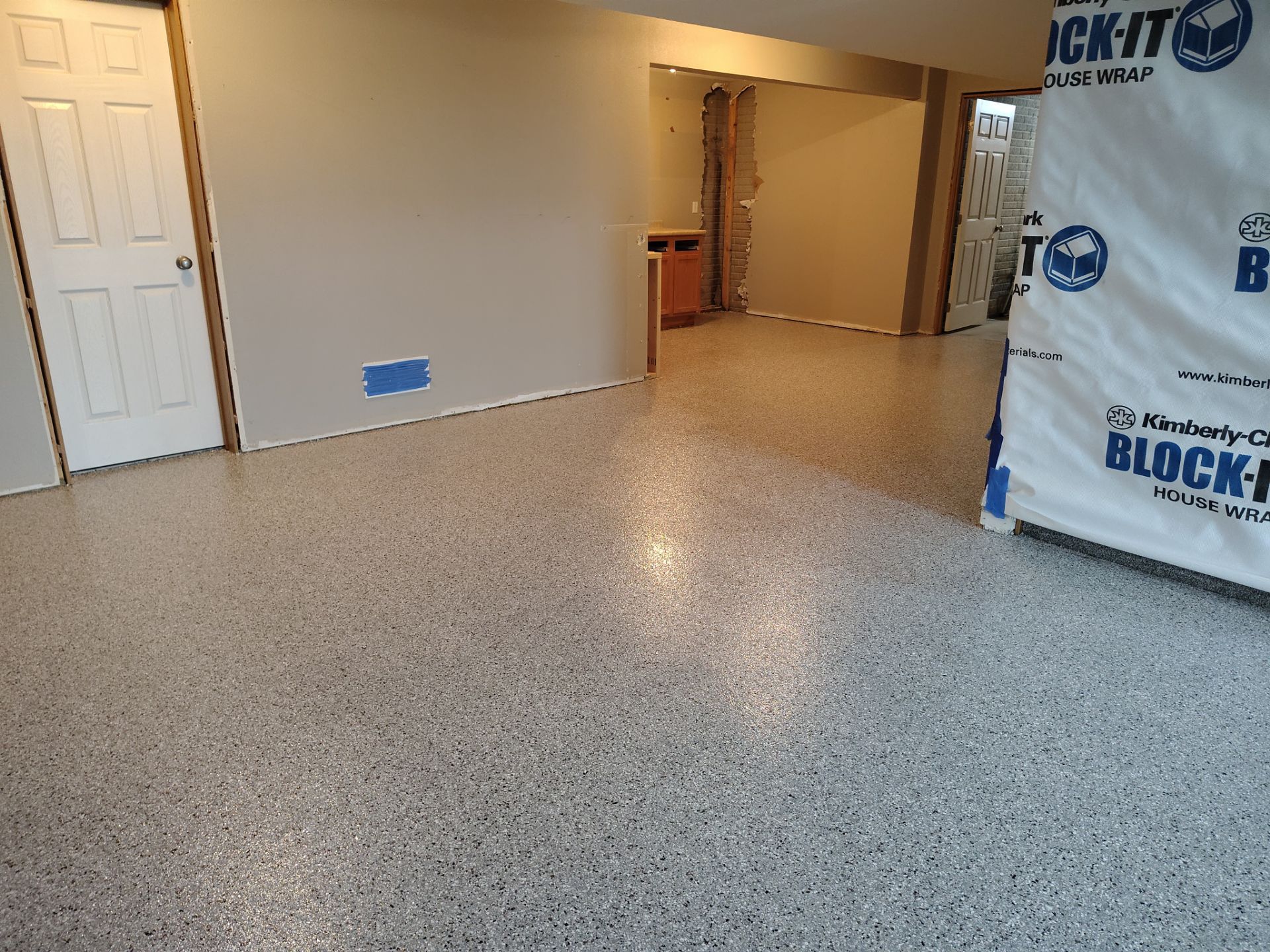 Maxwell, IA Coyote Flake Garage and Basement by Revival Concrete Coatings