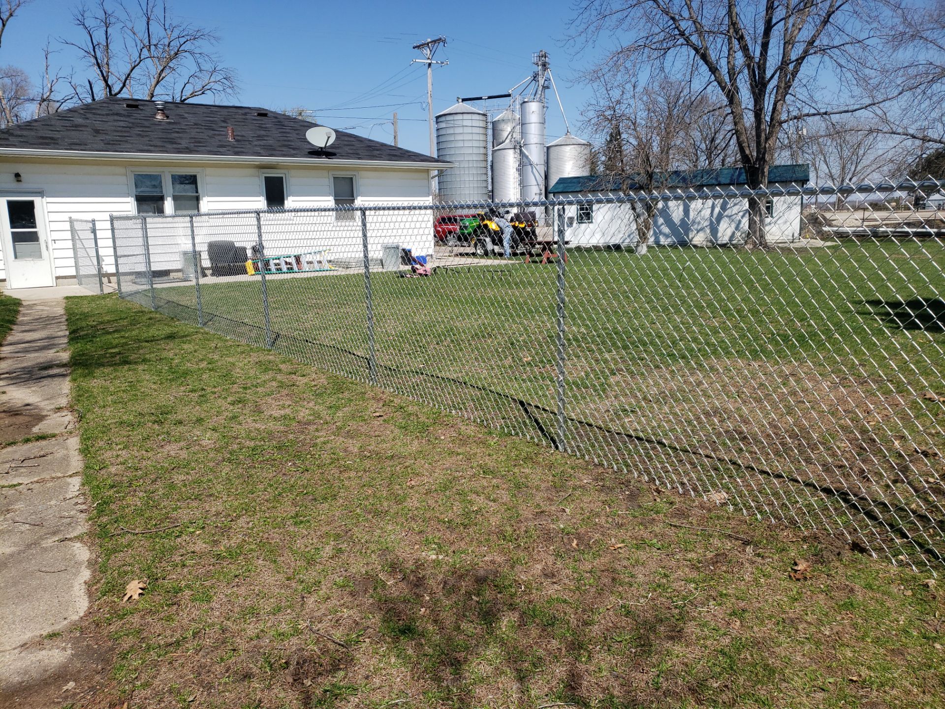 Residential Galvanized Chain Link Perimeter Fencing and Gate Installation by Perfect Picket Fence and Stain