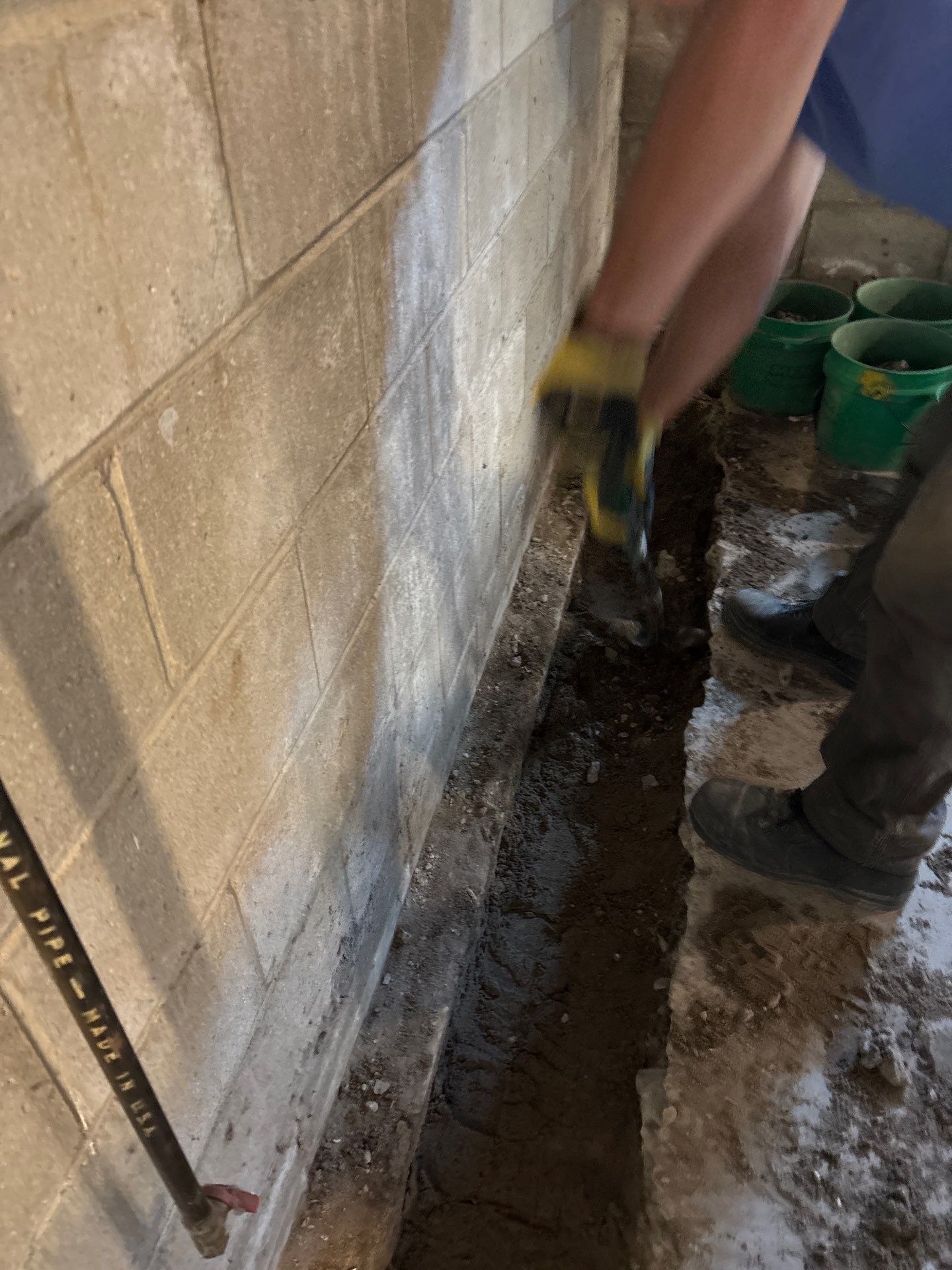 Interior Drain Tile & Buried Discharge in South Minneapolis by Waterproofing Northeast