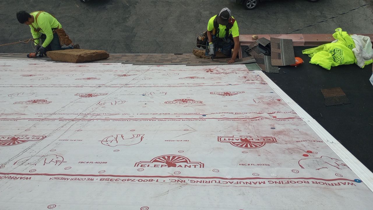 Commercial Roofing Installation using Performance Shingles by Mr. Roofer