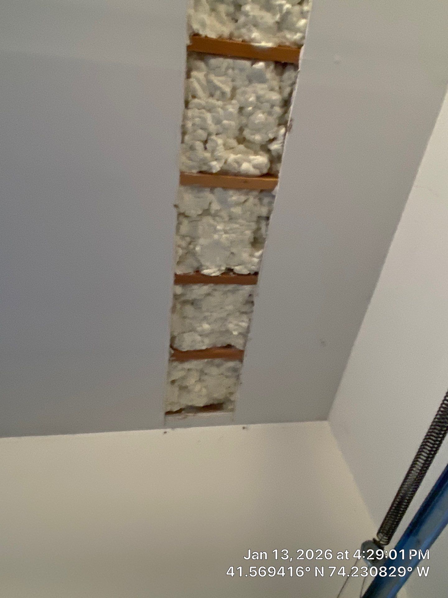 Garage ceiling using open cell spray foam by NYS Foam & Energy