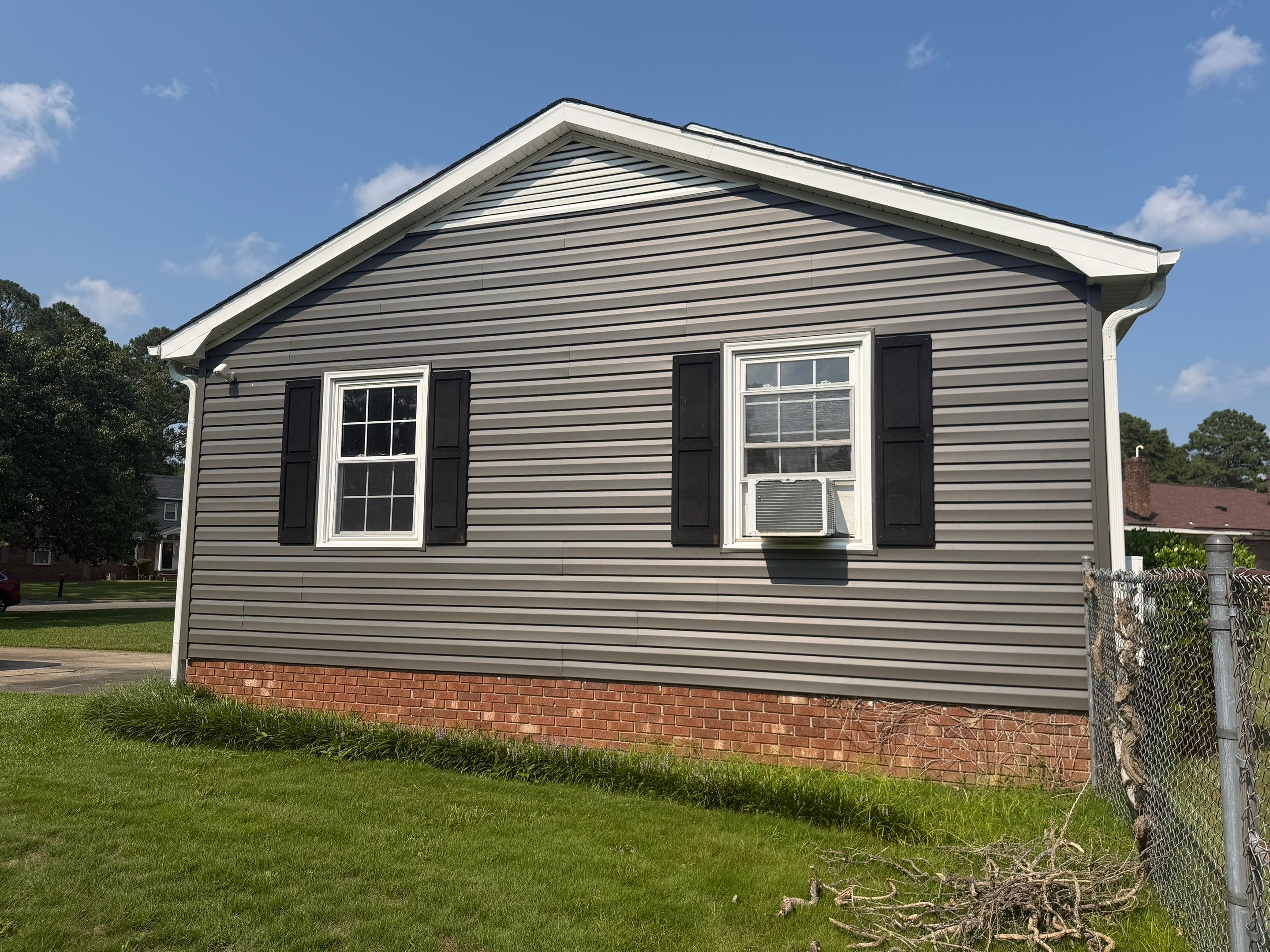 Dark Gray Siding and Custom Deck Installation in Kinston by The Remodeling Company