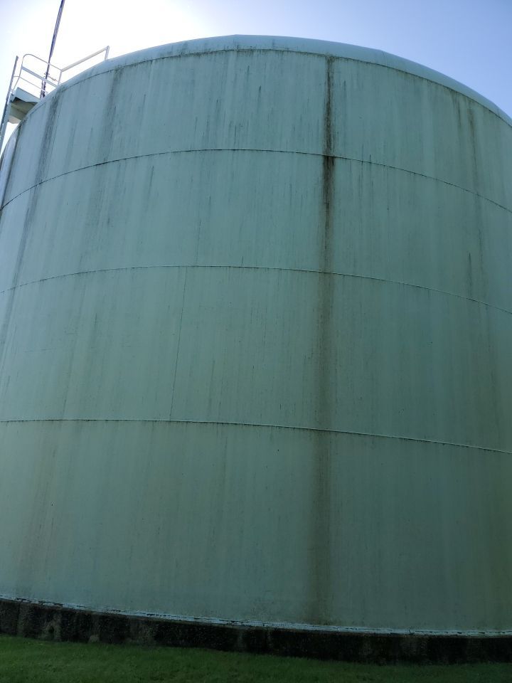 Water tank cleaning by Northern Power Washing LLC.