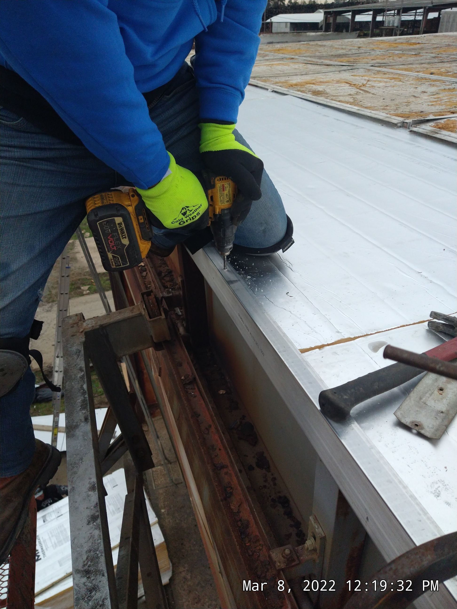 Commercial Roofing Installation using Aluminum Roofing panels by Hostetler Roofing