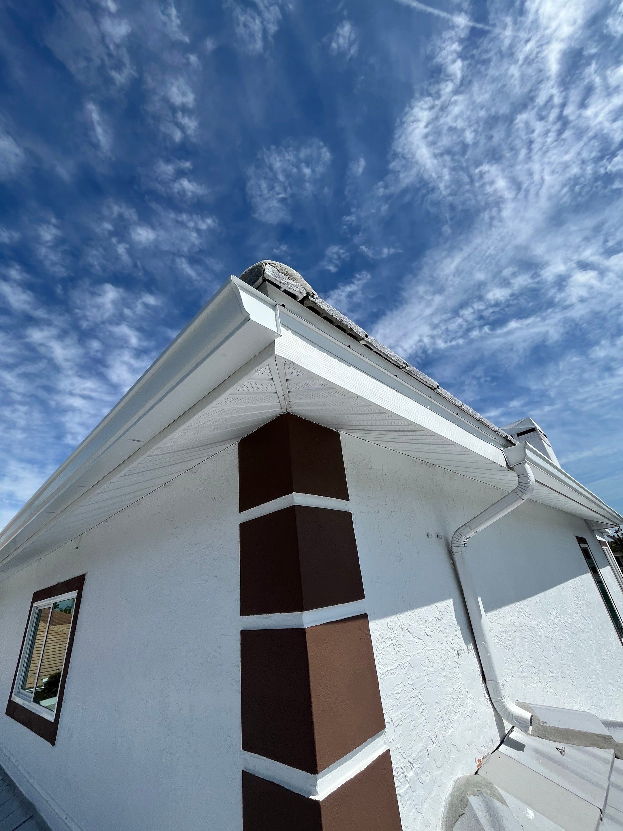 Repainting and Upgrading Gutters in Sarasota FL by Gutter Professors