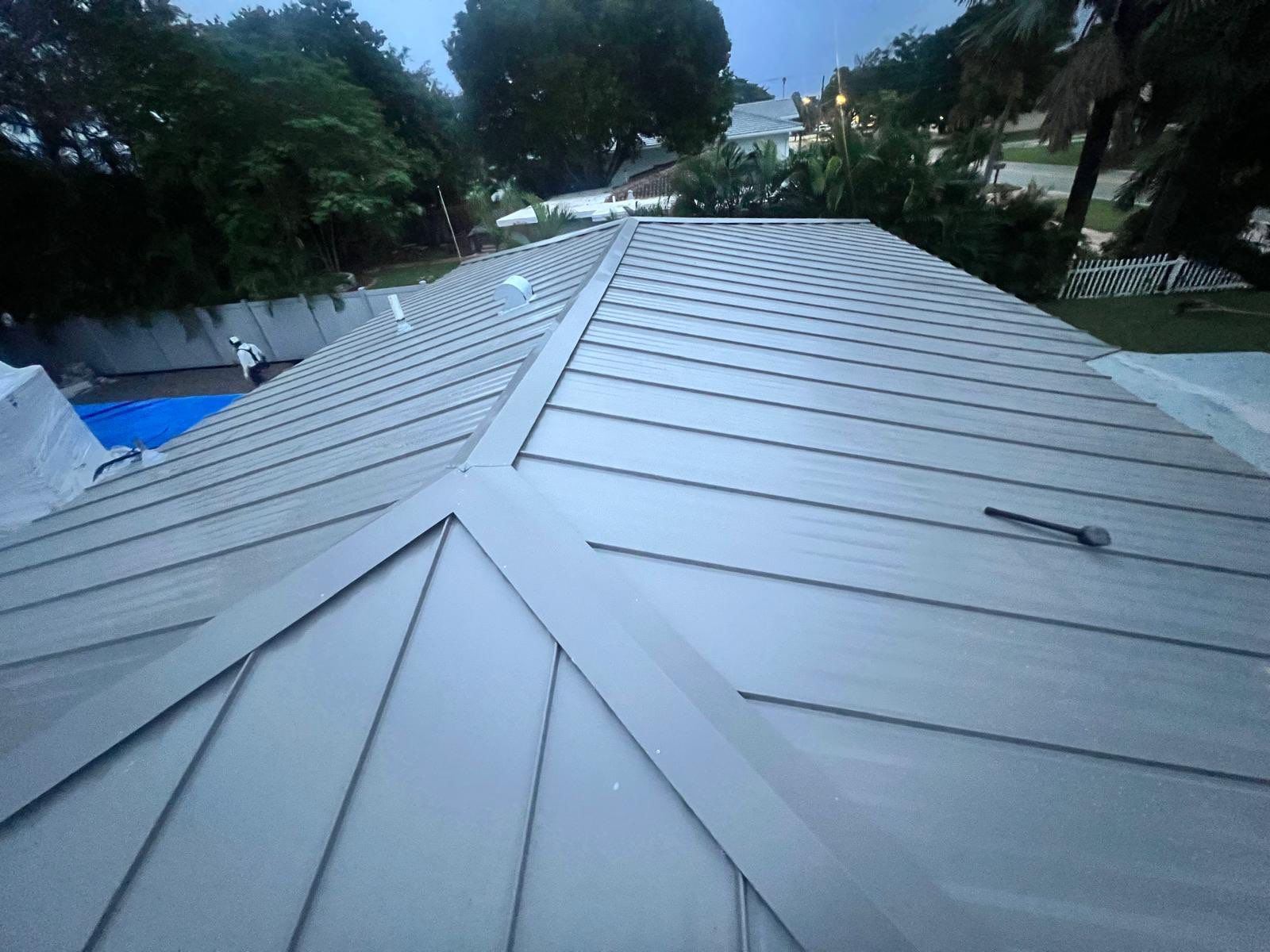 Residential Roofing Installation using 1" Nail strip metal roof by BLUES BROTHERS ROOFING