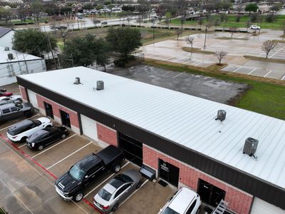Commercial Roofing Installation using Double lock Mechanical Standing Seam Metal