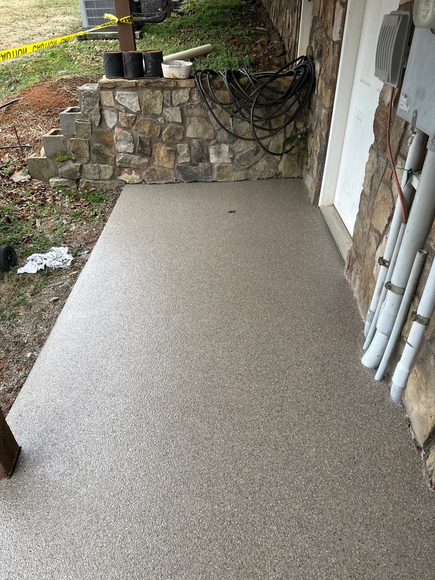 Back Patio using Obsidian by Elite Floor Solutions