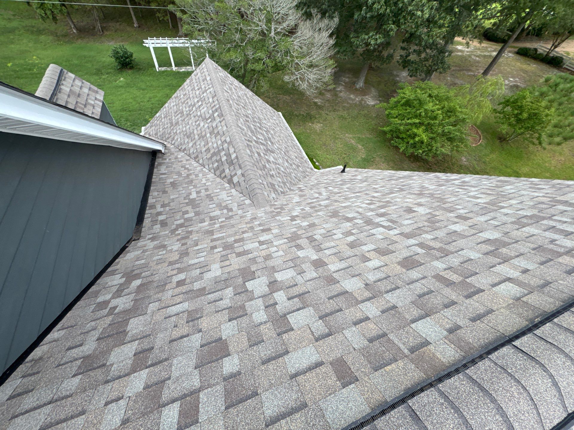 Roof Replacement and White Gutter Installation in Gloucester by Cade Construction
