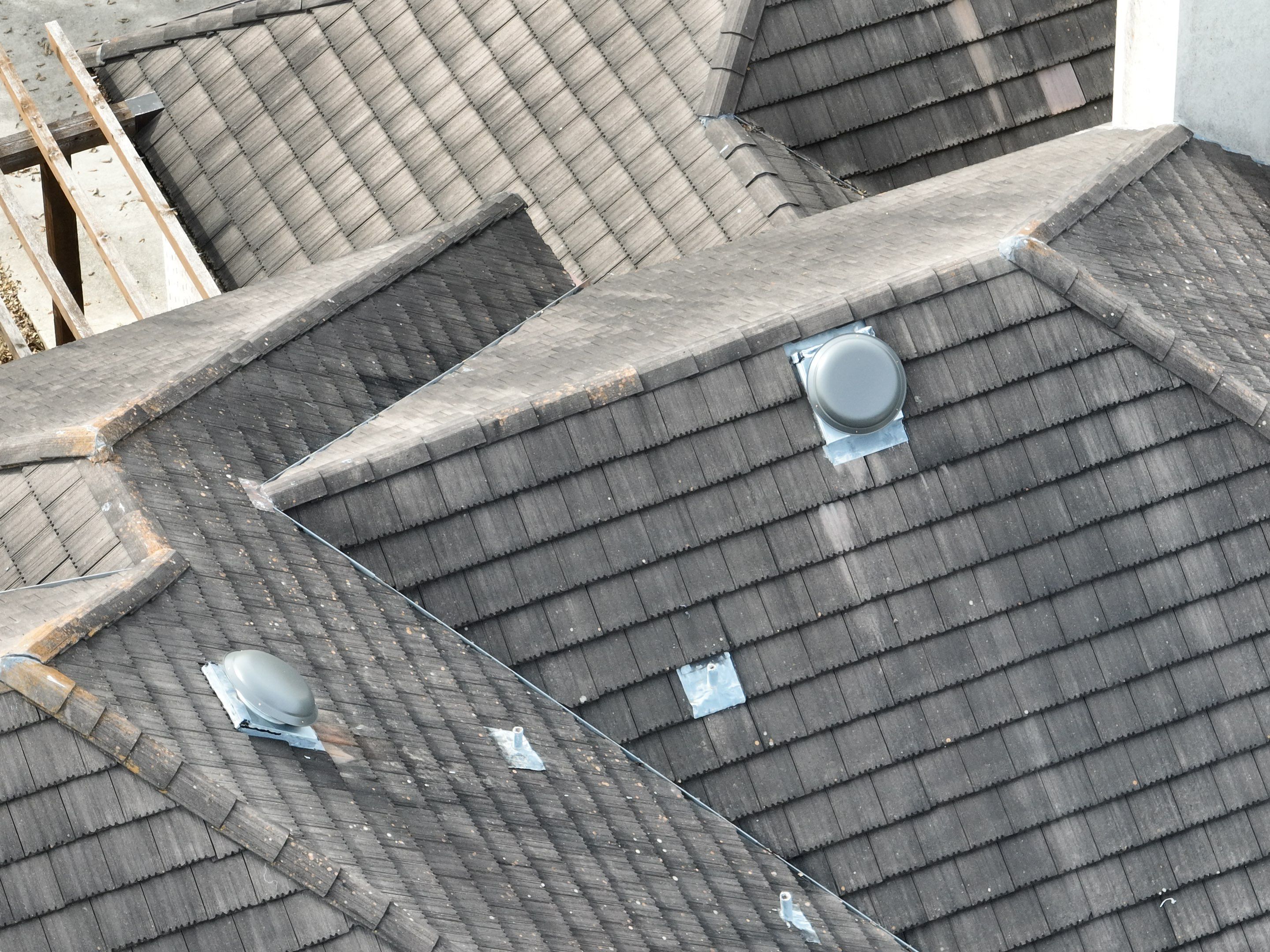 Tile Roof Repair  by Premier Roofing and Contracting