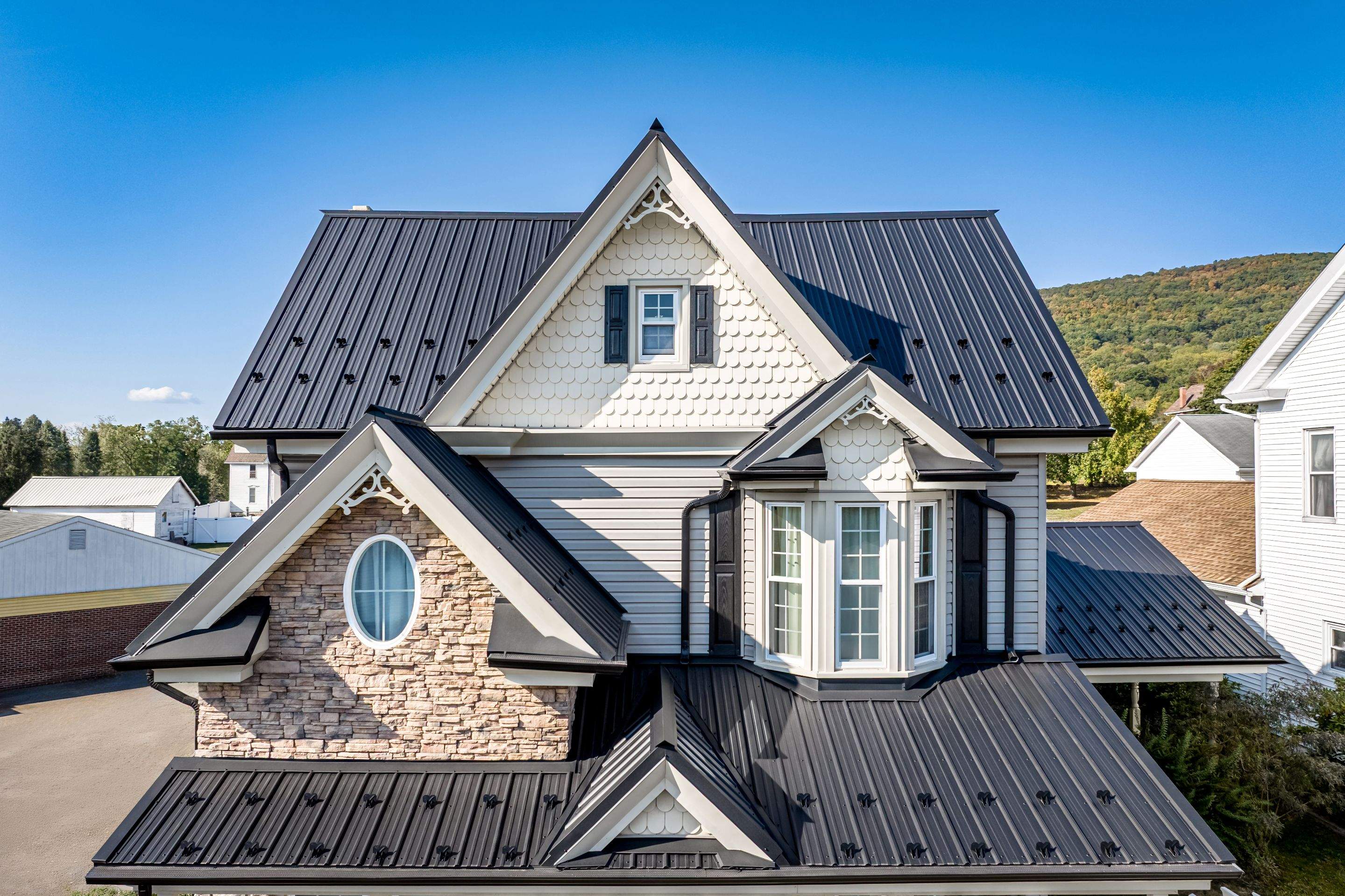 Textured Black Meal Roof by Esh Builders