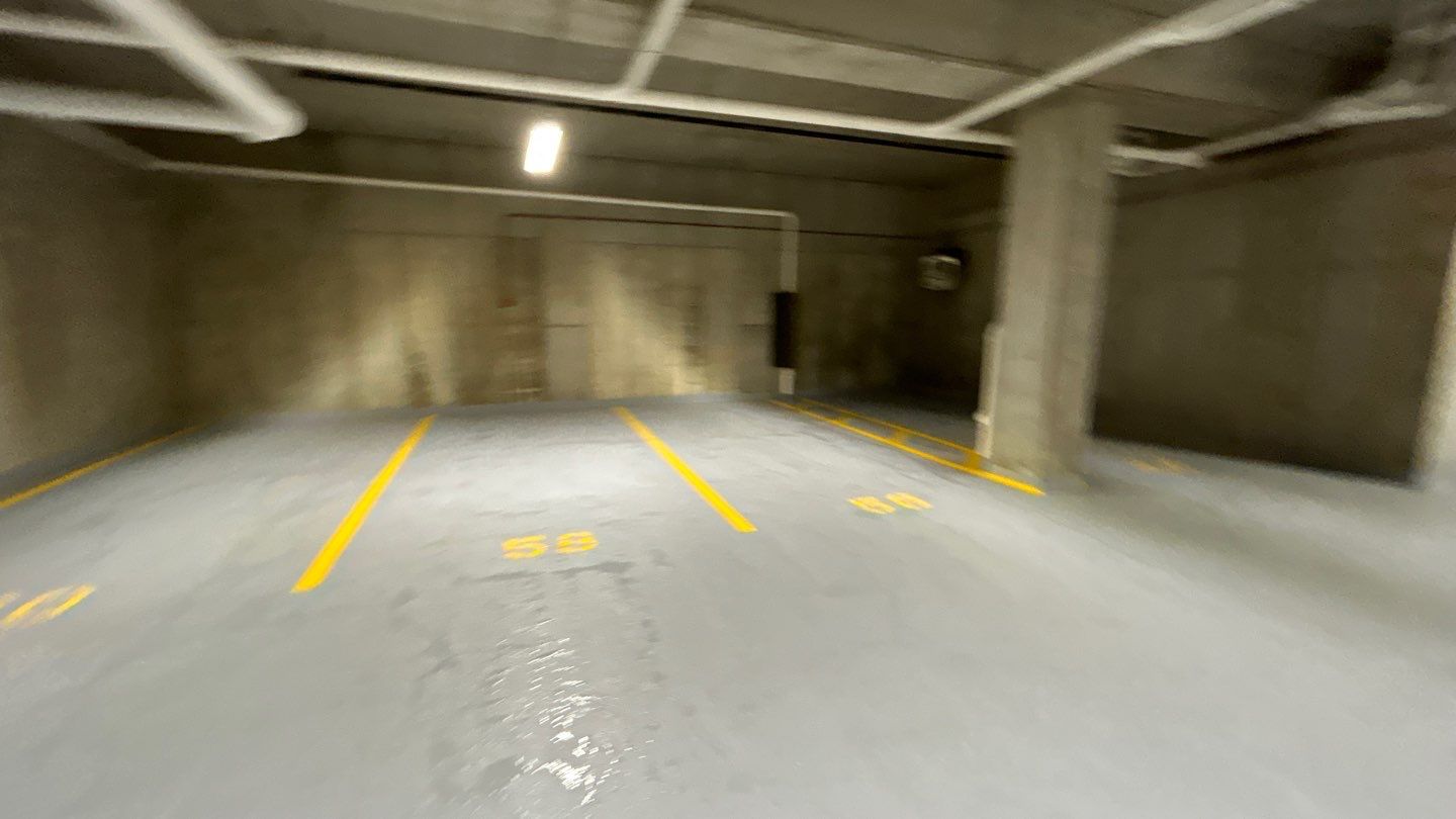 Parking garage using Hot water by Northern Power Washing LLC.