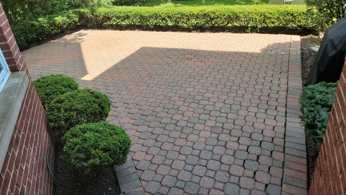 Brick paver repair, clean and seal by Northern Power Washing LLC.