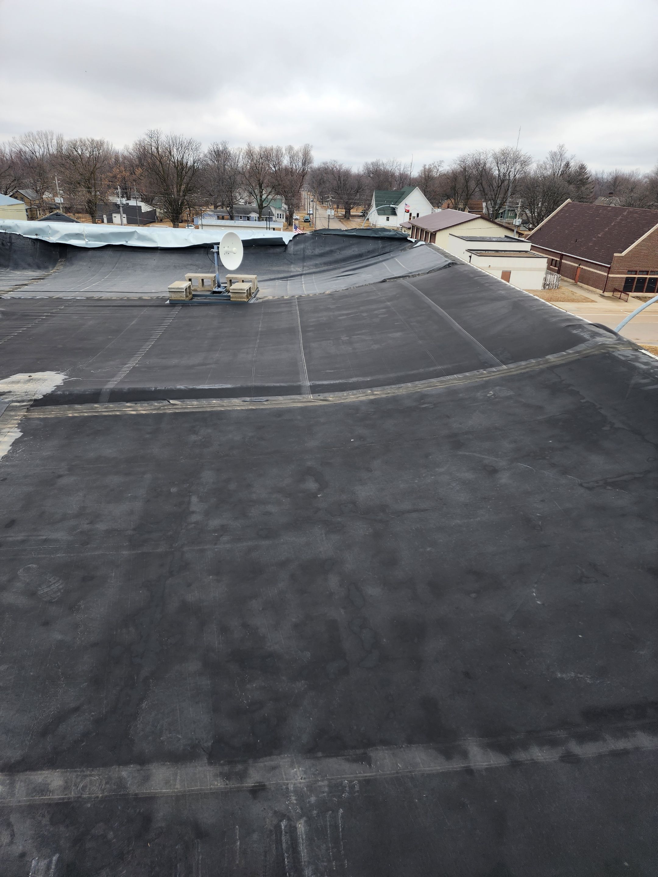 Roof Recover on a downtown building in Lake City  by Grell Roofing, LLC