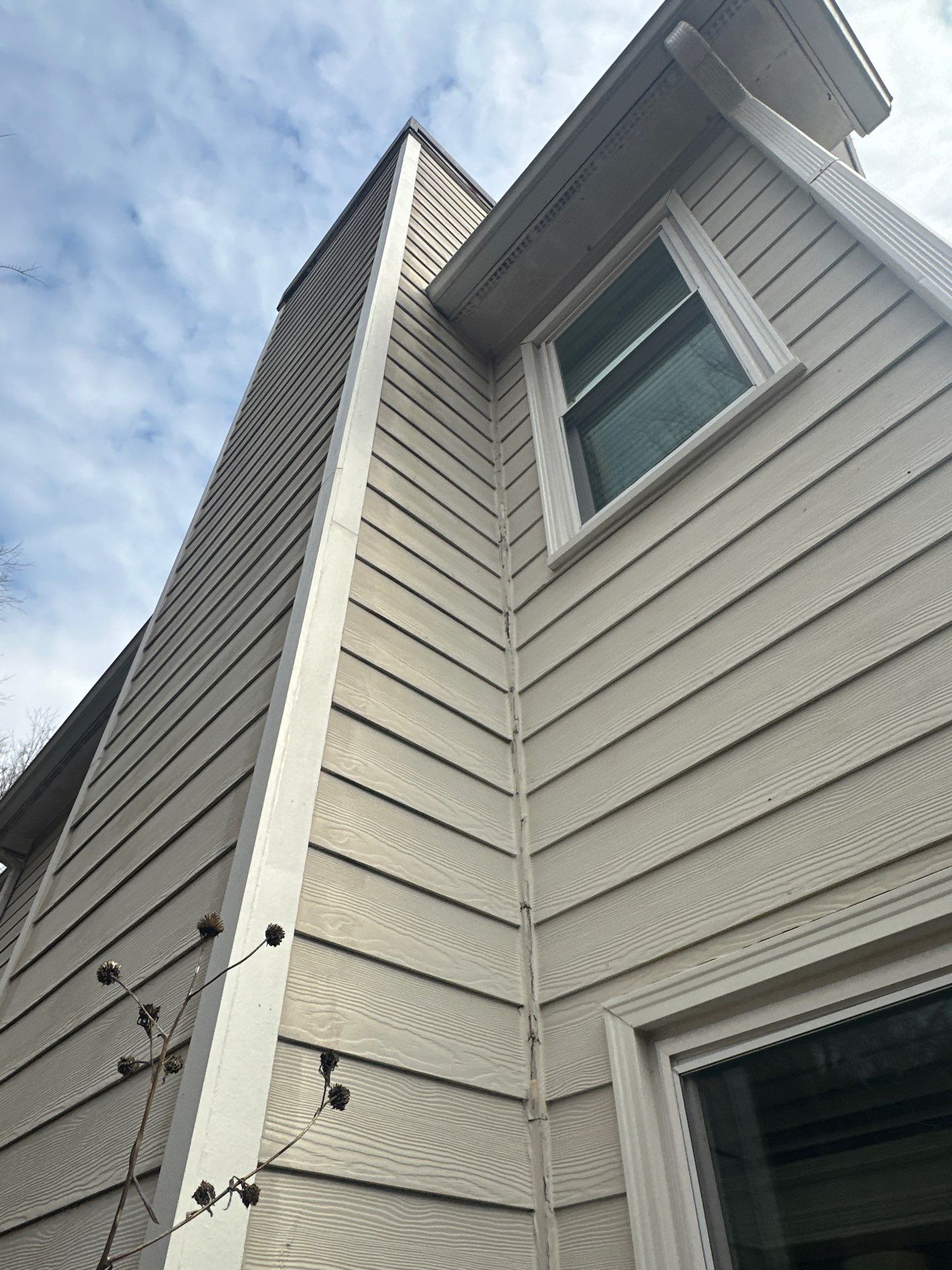 Marietta, GA Chimney Siding, Fascia, and Soffit Replacement using James Hardie Lap Siding, Hardie Trim, and Hardie Panel by Nelson Exteriors 
