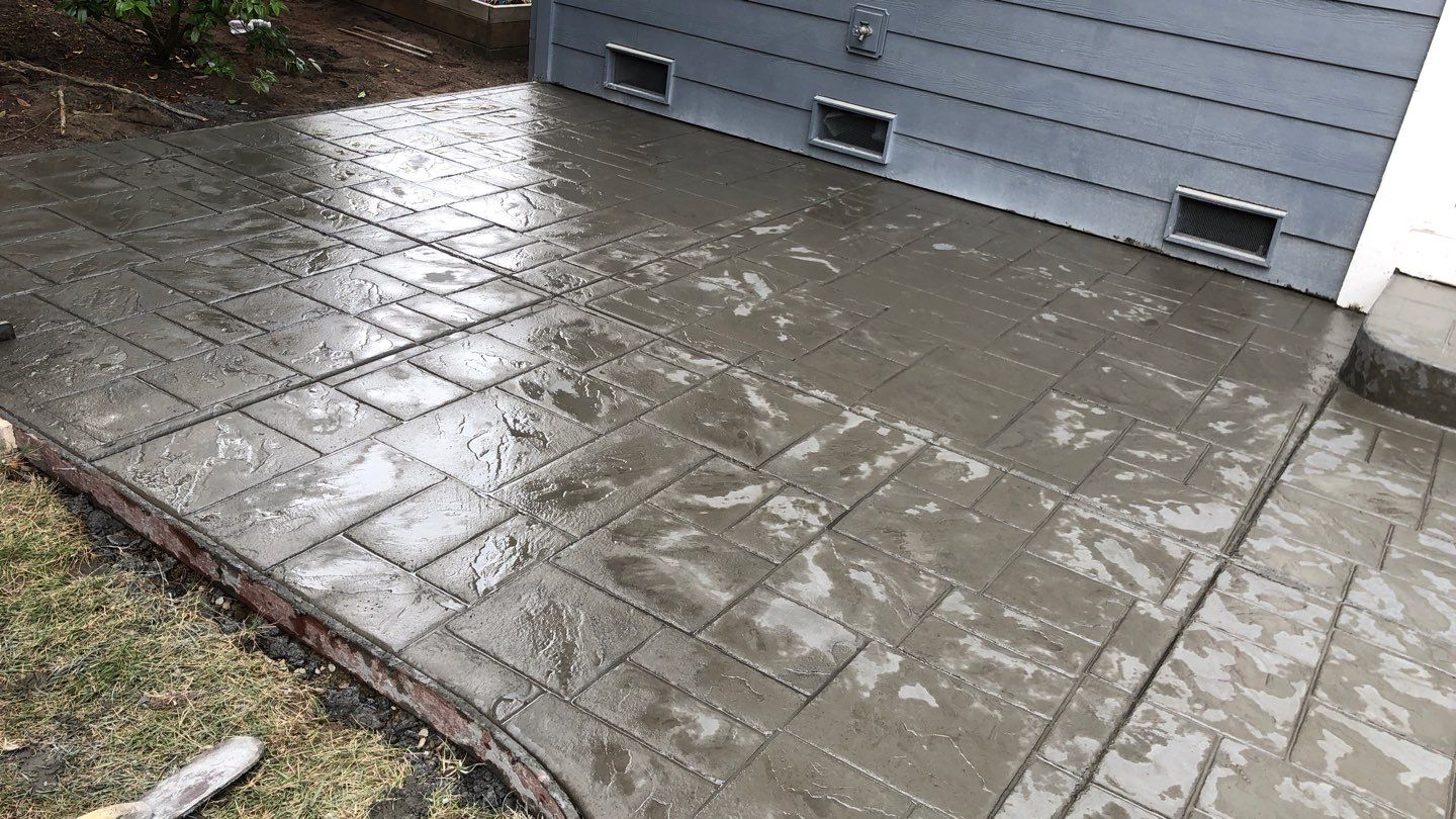  Amy | Stamped Finish Patio, Concrete Project by Jireh Asphalt & Concrete Inc 