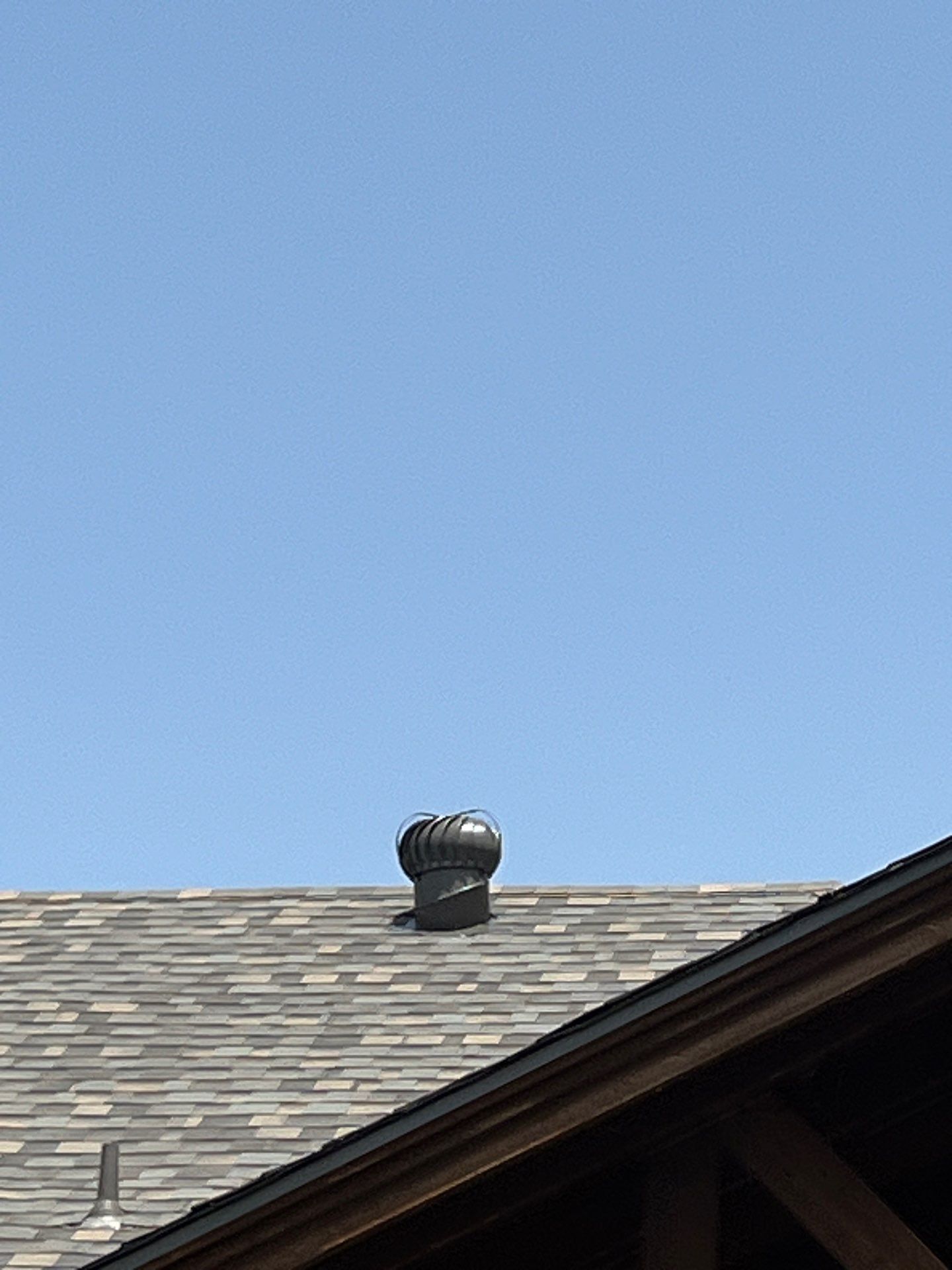 Red brick with IKO Cornerstone  by Tejas Roofworks + Restoration