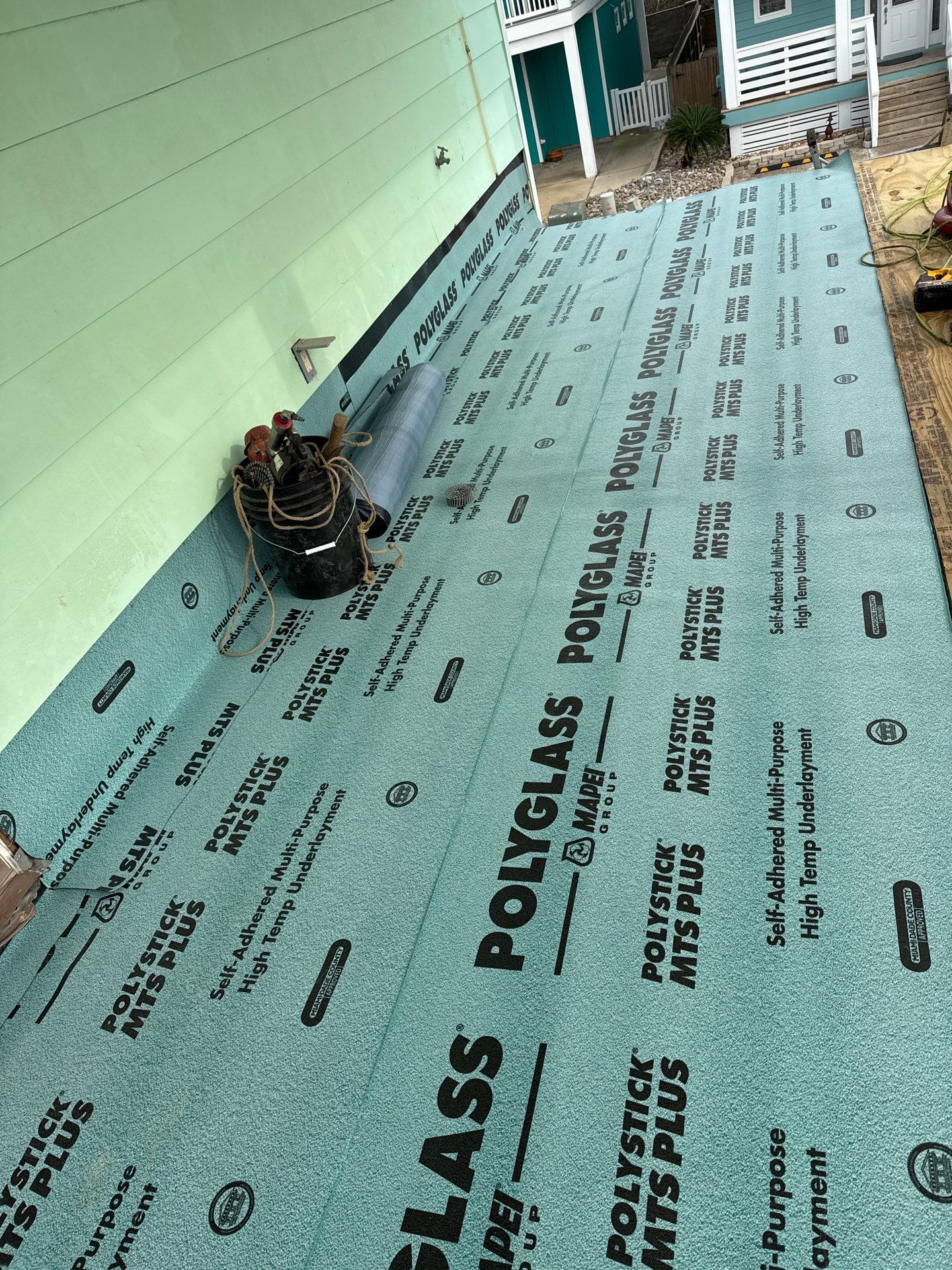 Walk Out Patio Cover by Bayfront Roofing and Construction