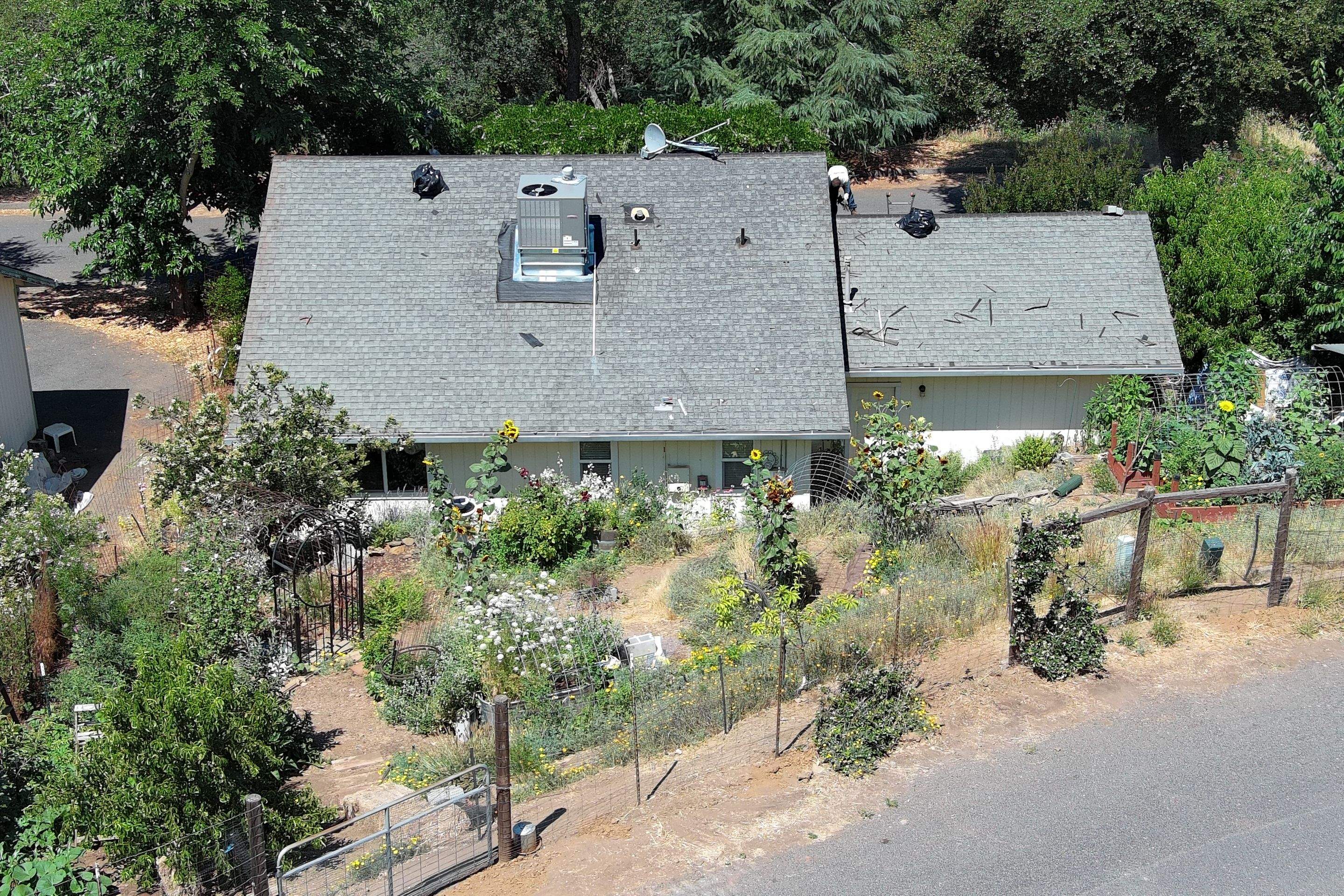 Metal roofing installation using ASC Standing Seam metal by Straight Edge Roofing Inc