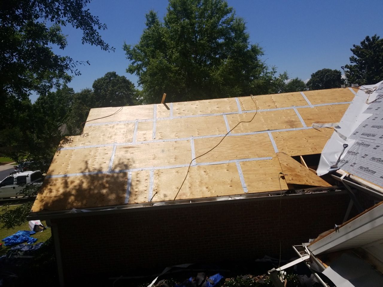 Residential Roofing Installation using Roof Replacement by American Roofing & Construction LLC