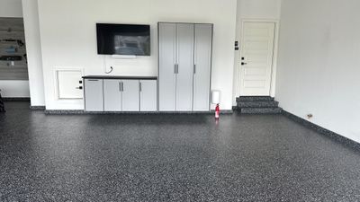 John H. received his dream garage with cabinets and a Banner Garage Floor