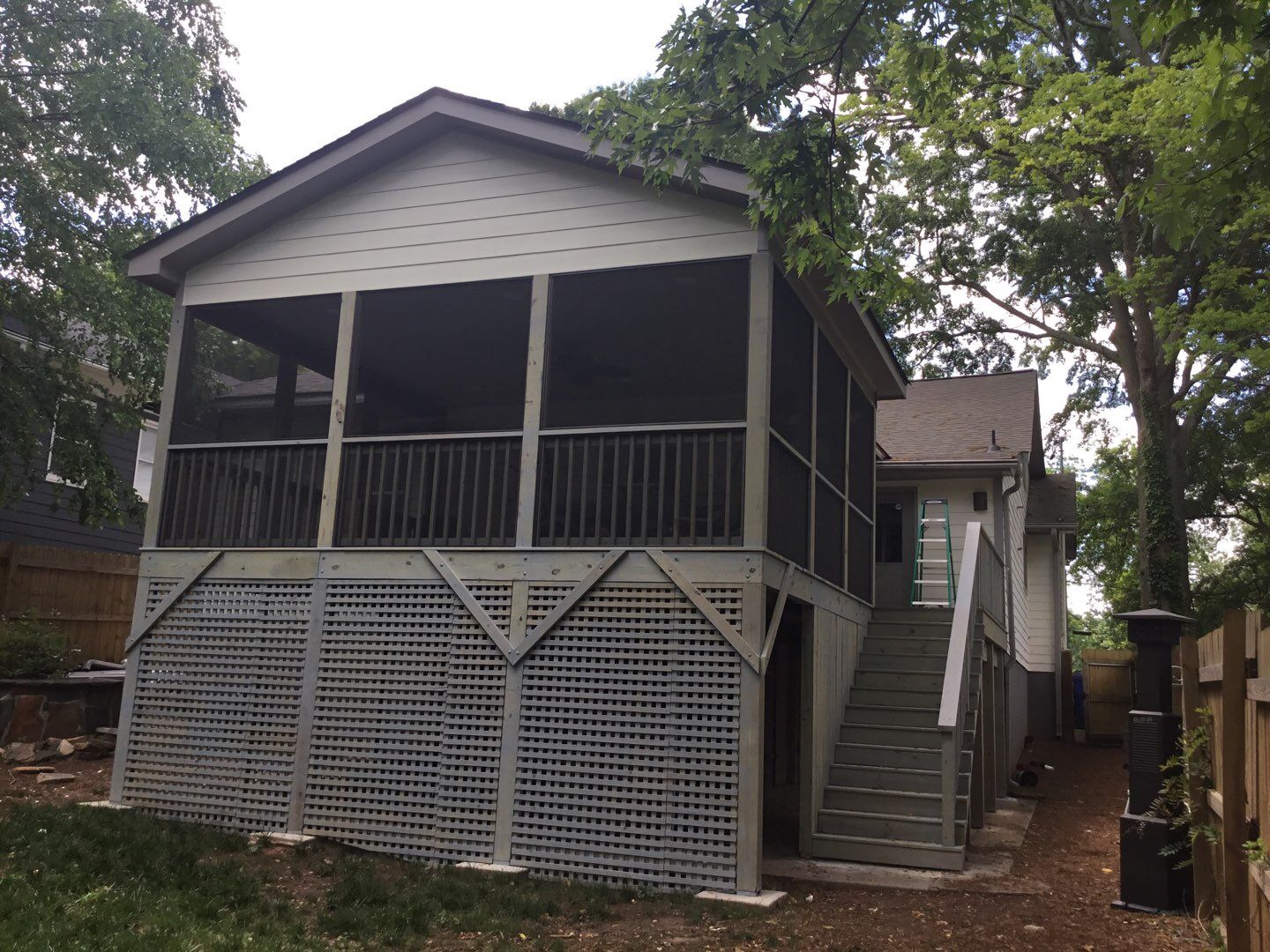 Custom Screened Porch Addition with Vaulted Wood Ceiling in Atlanta by Swift Home Renovations