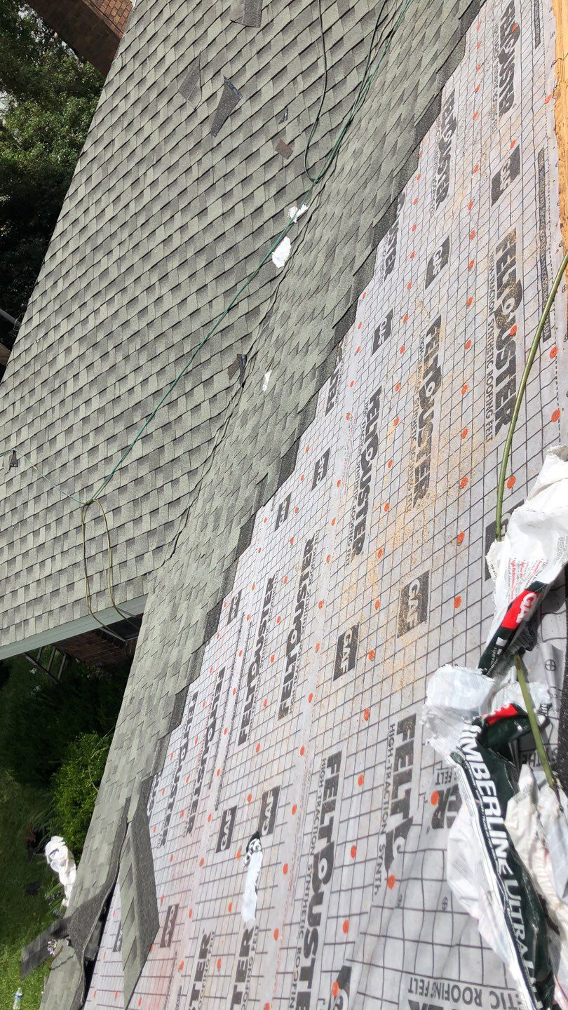 Residential Roofing Installation using Roof Replacement by American Roofing & Construction LLC