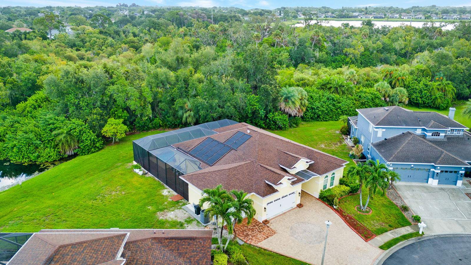 Custom Single-Car Garage Addition and Lanai Cage in Bradenton by Vertical General Contracting 