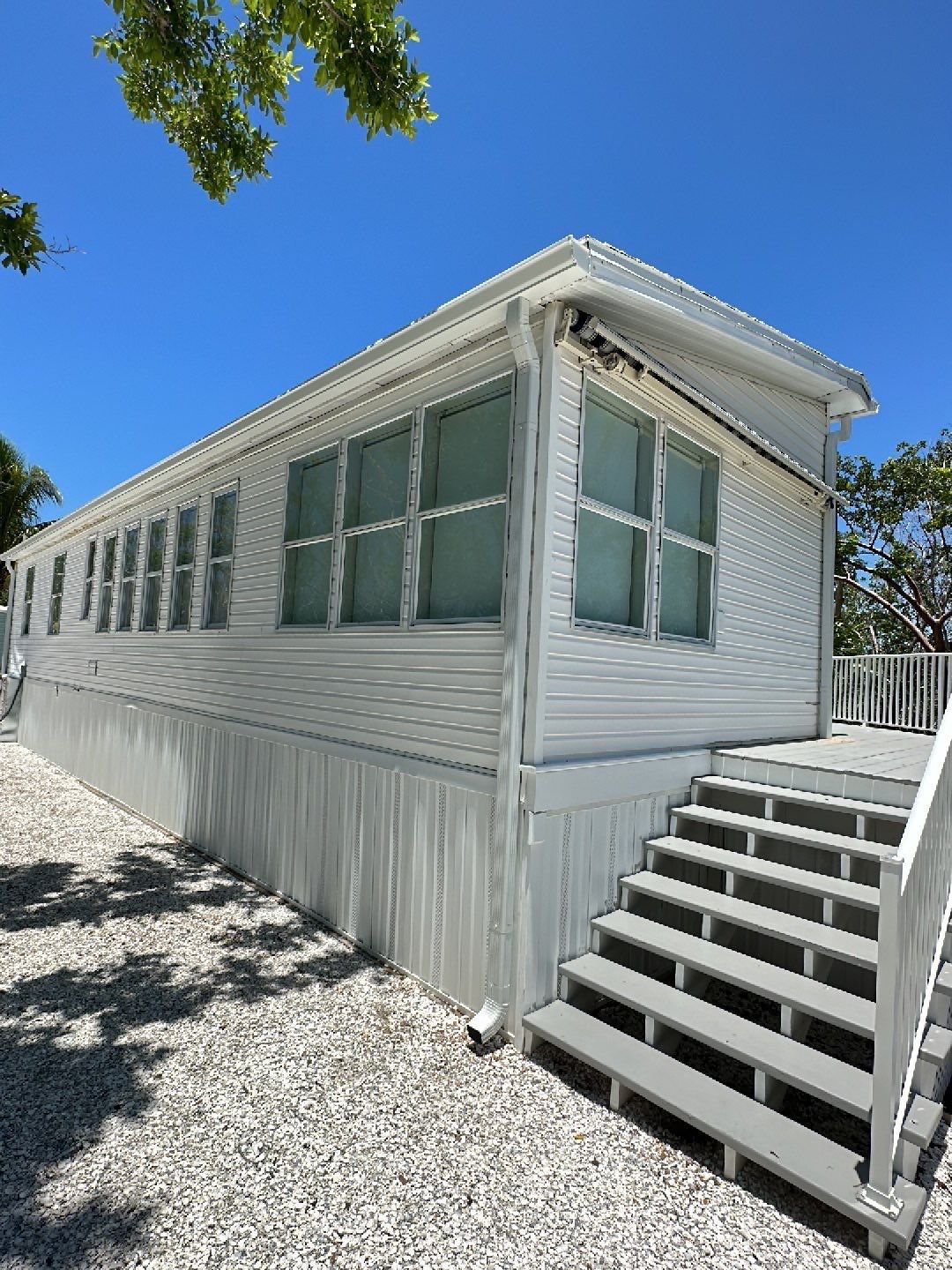 Downspout Installation using Charcoal Grey in Sanibel FL by Gutter Professors