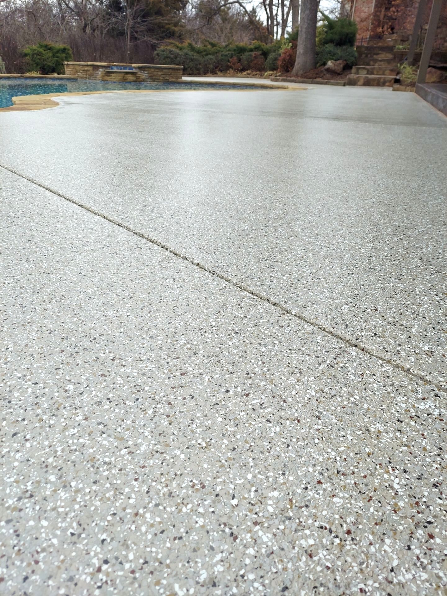 Pool Deck Install with Pebble Beach by Copperhead Coatings