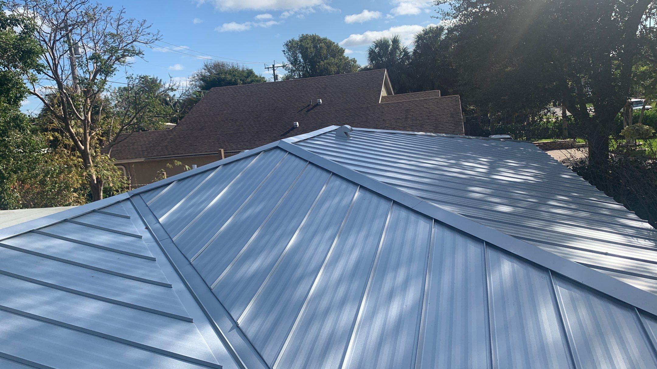 Residential Roofing Installation using 1" Nail strip metal roof by BLUES BROTHERS ROOFING