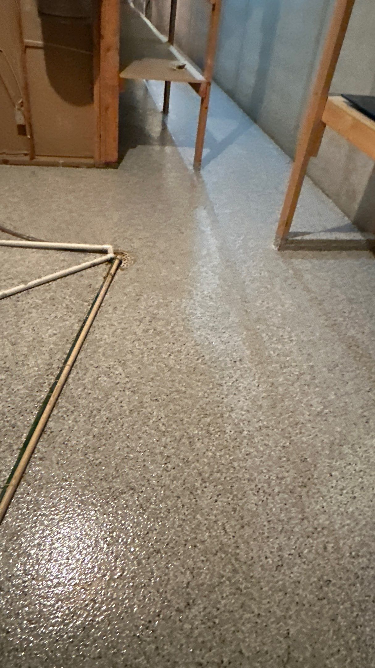 Robin K. decided coyote flake would look great in her garage and basement  by Banner Garage