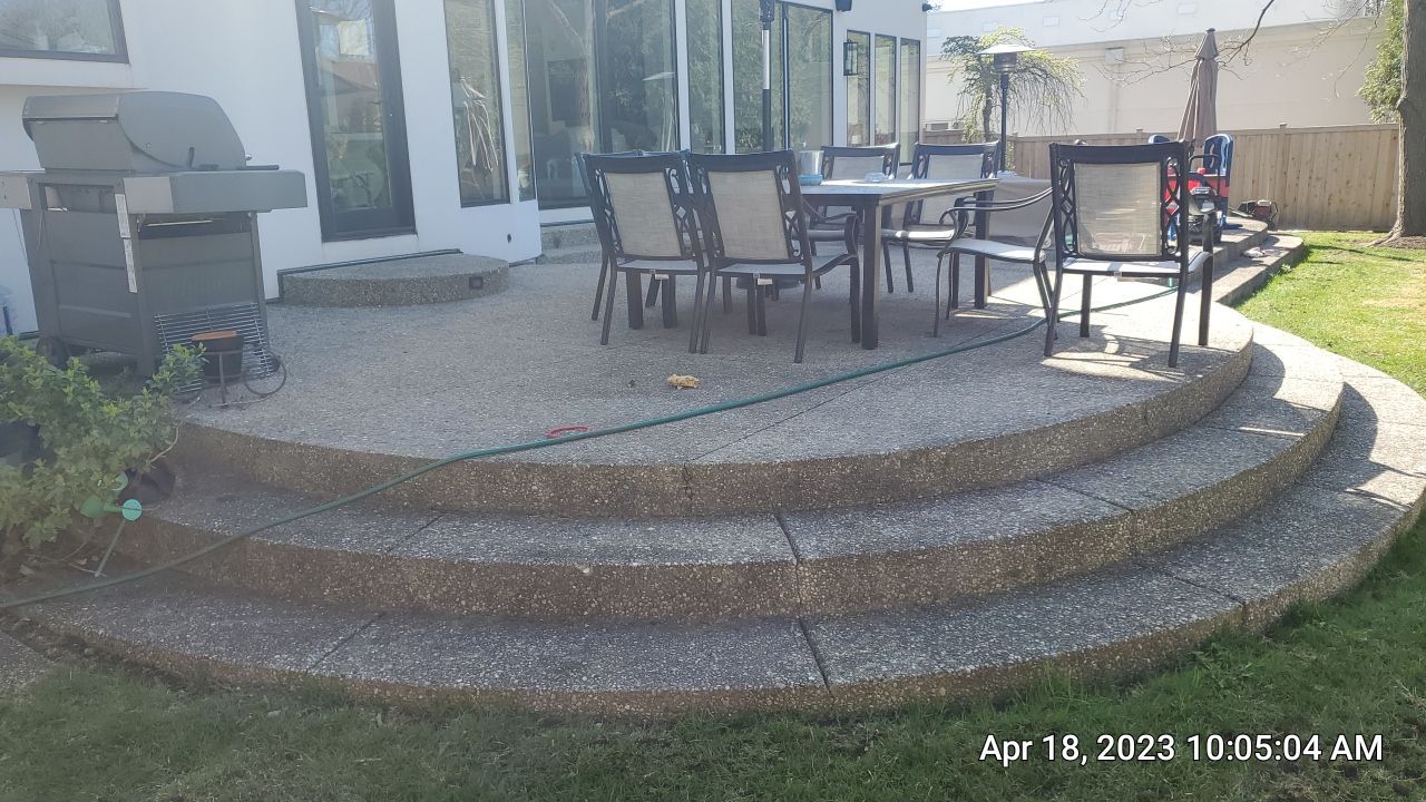 Aggregate concrete cleaning and sealing using Surebond SB-9000 by Northern Power Washing LLC.