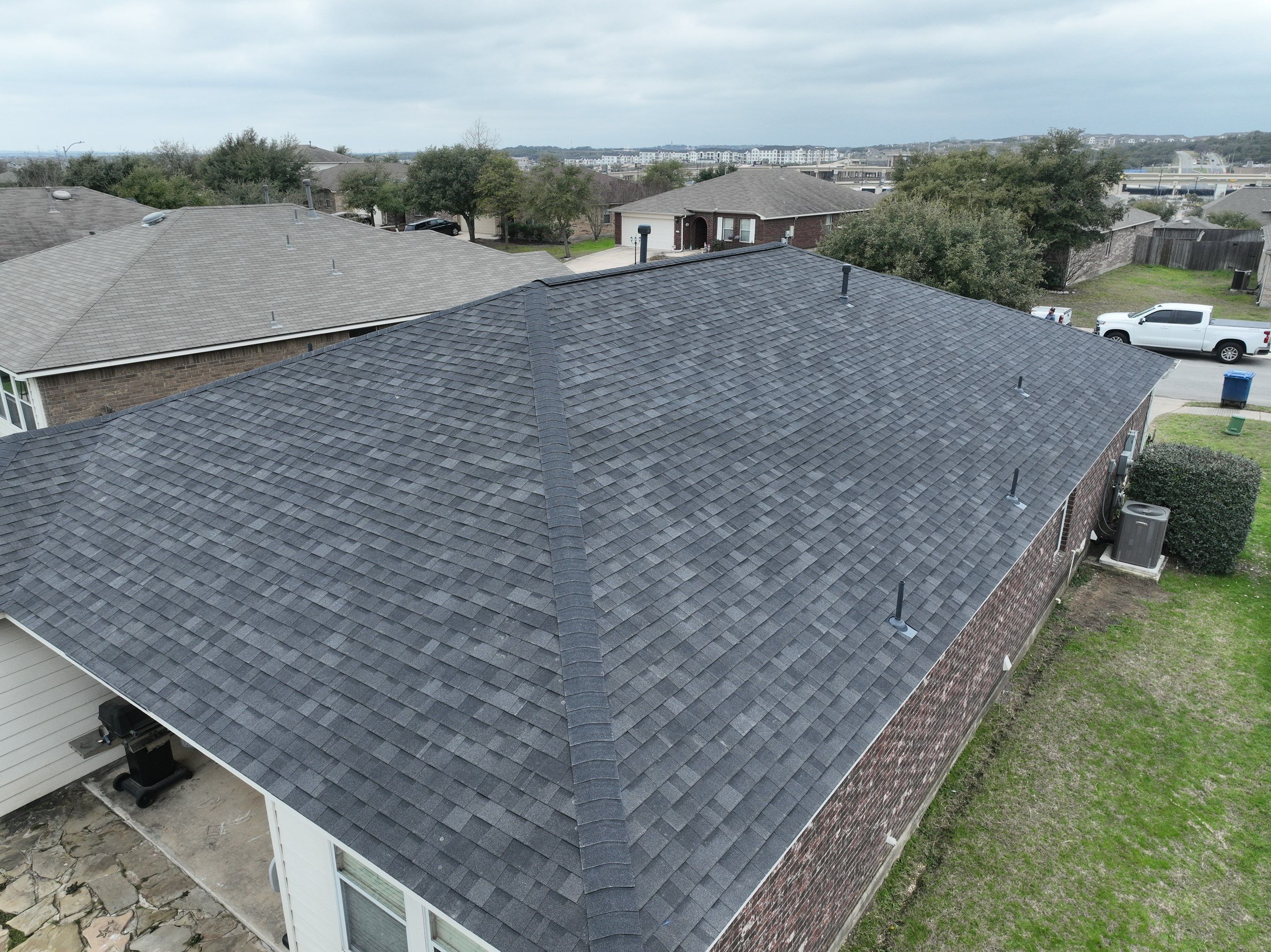 Residential Roof Replacement using 30 Year Laminate Shingles with High Profile Ridge by Premier Roofing and Contracting