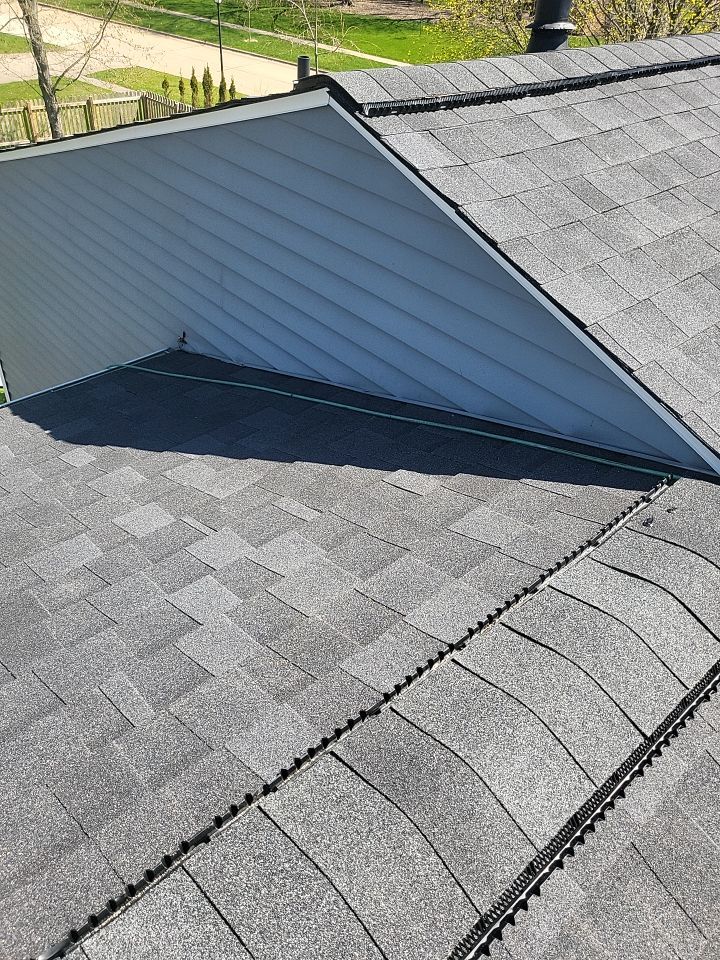 ATLAS PINNACLE COLOR: BLACK SHADOW DRIP EDGE: WHITE by Eagle Eye Roofing