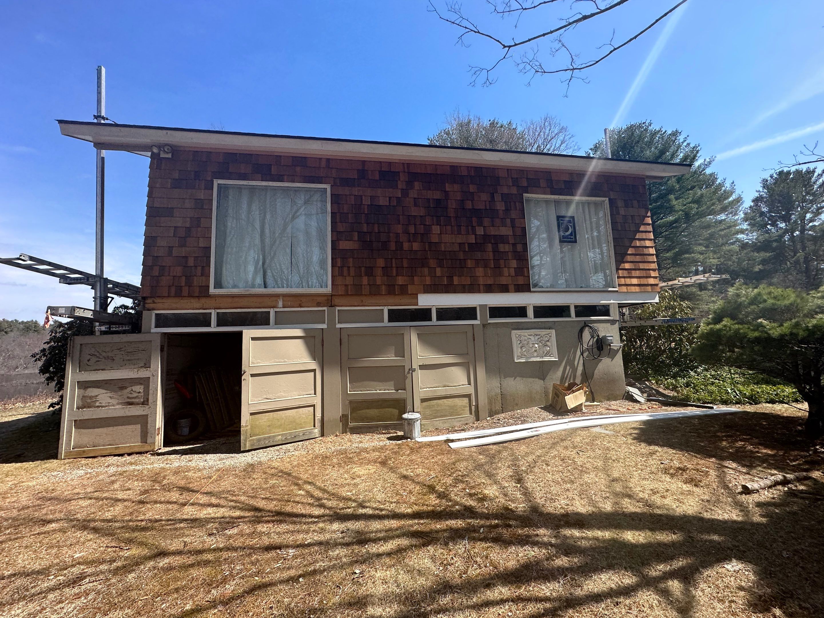 Siding Installation using Perfection Red Western Cedar Shingles  by Loyalty Exterior Solutions 
