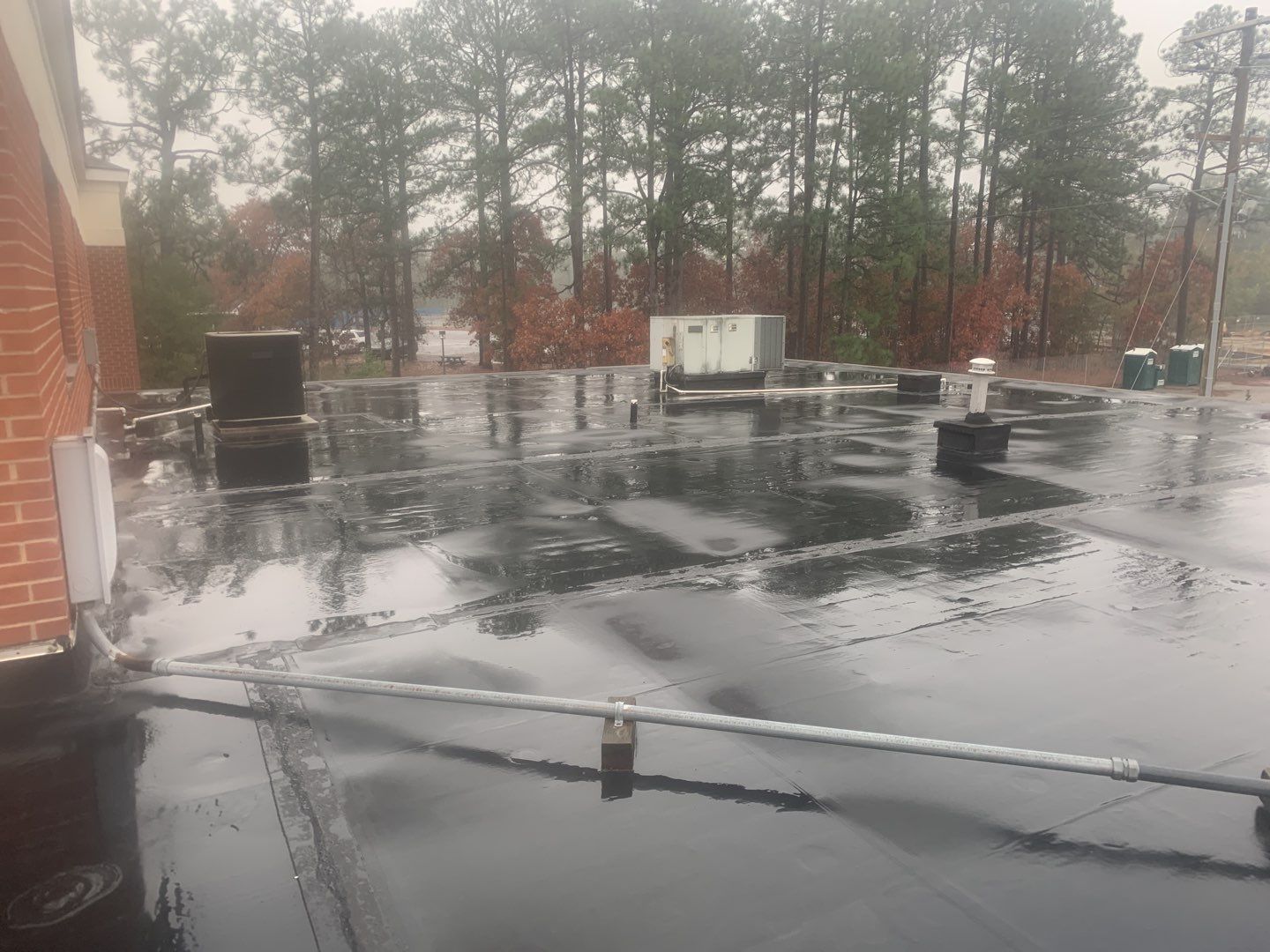 Re Roof (TPO) by American Roofing NC