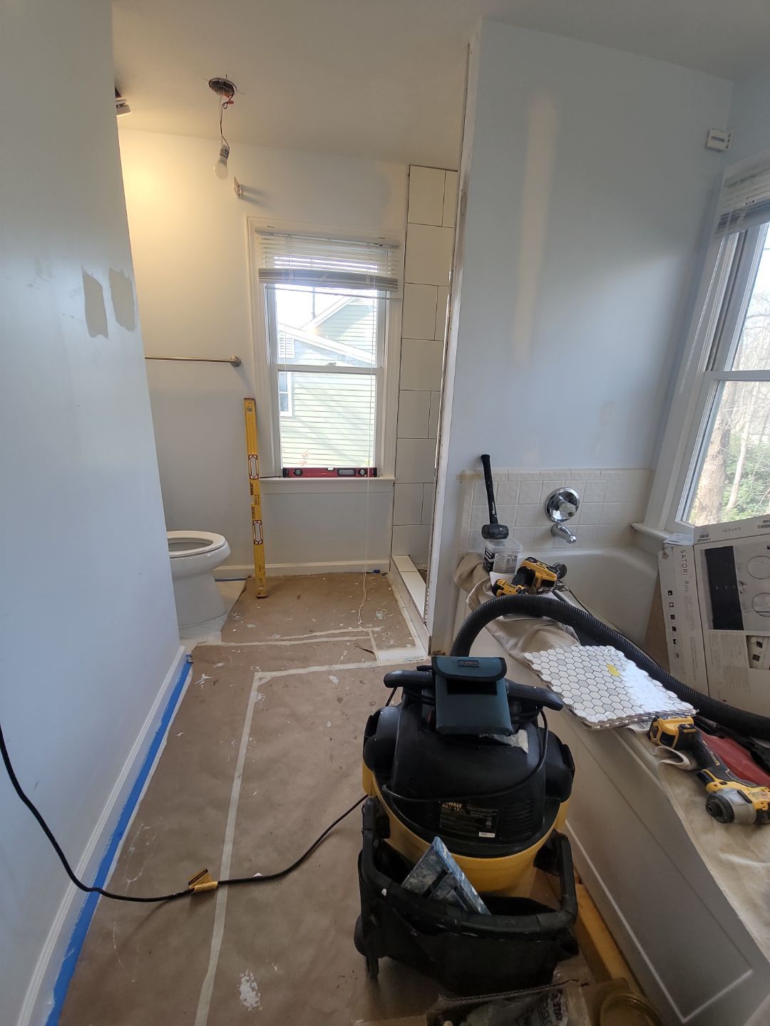 From Cramped & Carpeted to Bright & Modern: A Cary Bathroom Transformation by Elite Remodeling and Design LLC