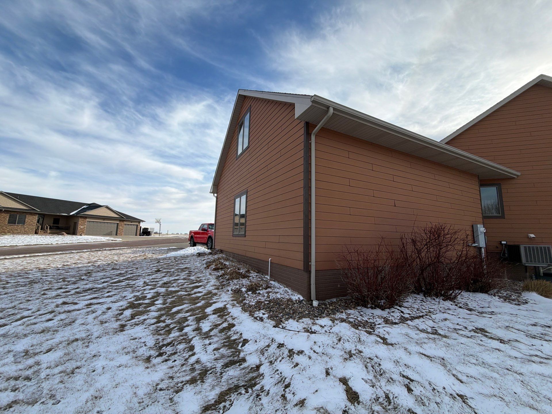 Residential Exterior Painting and Siding Restoration in Crooks by Select Painting, Coatings & Garage Cabinets