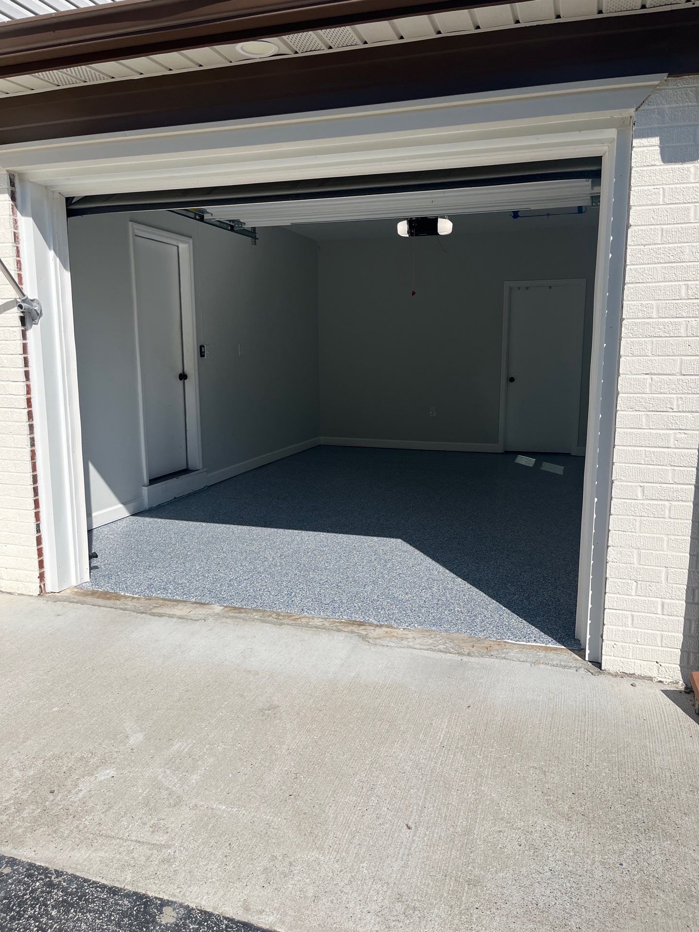 Garage Floor Coating using Comet by My Garage Floor Guys