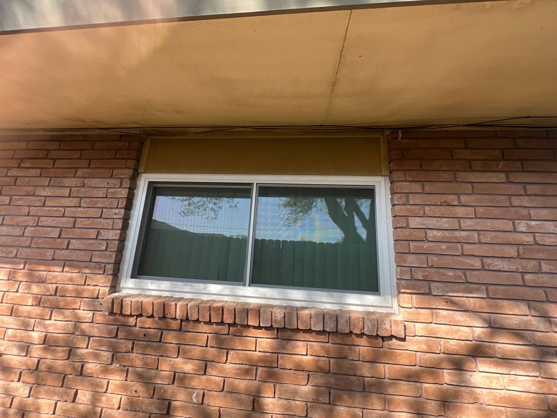 Windows in Brick with a Bay Window by Bayfront Roofing and Construction