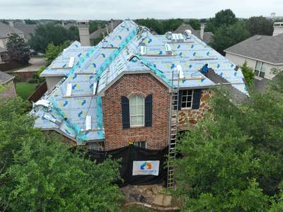 Residential Roofing Installation using Malarkey Highlander Weathered Wood Plus
