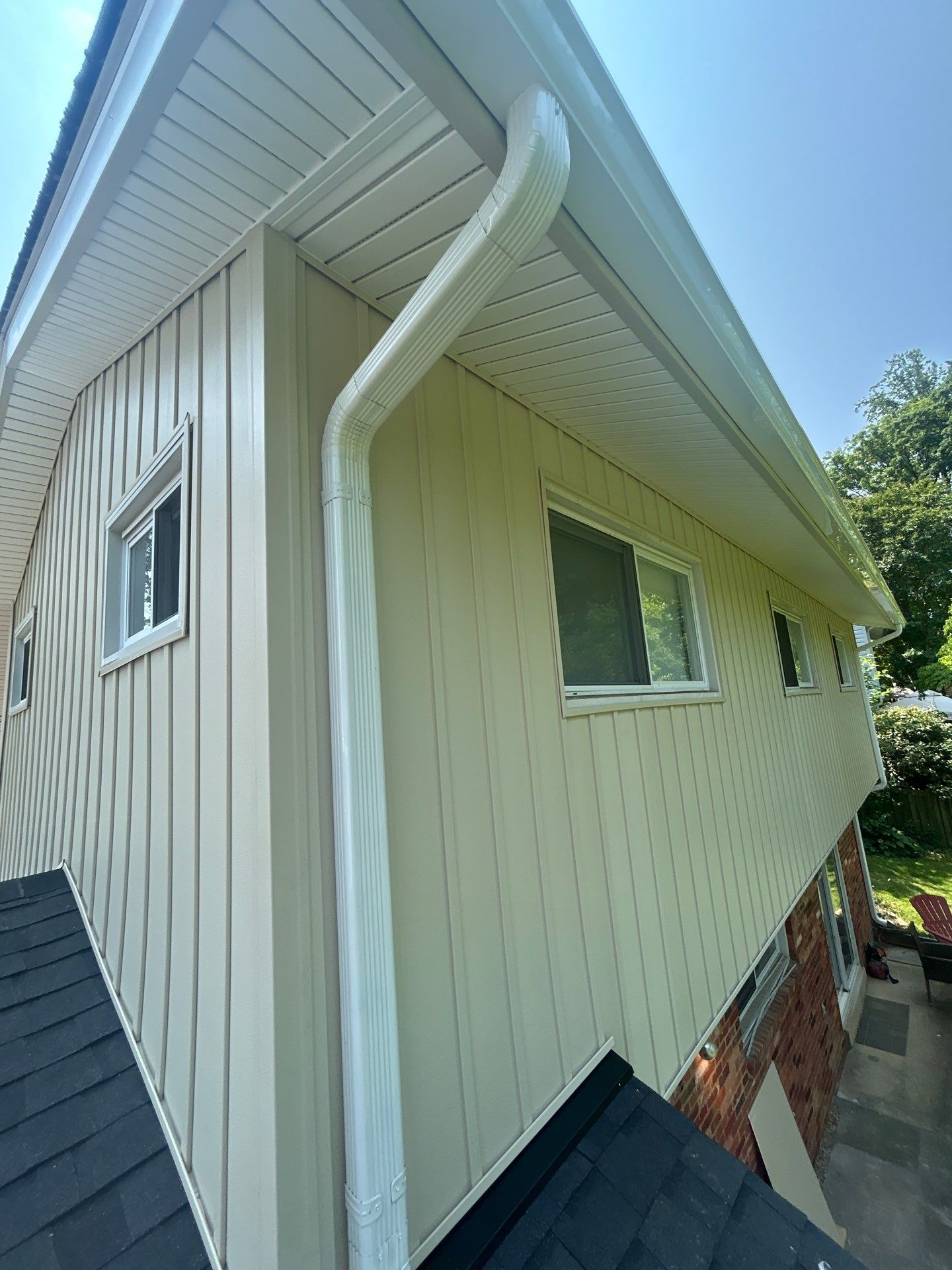 Fairfax: Residential Siding Replacement with CertainTeed 8" Board and Batten Siding in Desert Tan by RM Banning, Inc.
