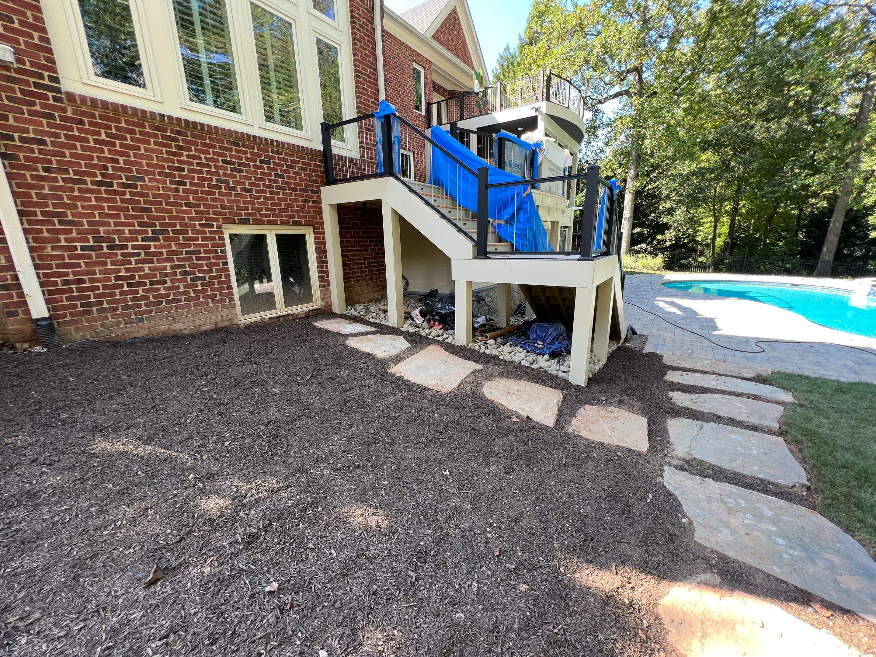 Custom Multi-Level Deck, Outdoor Kitchen & Pool Patio in McLean, VA by Sunburst Construction Inc