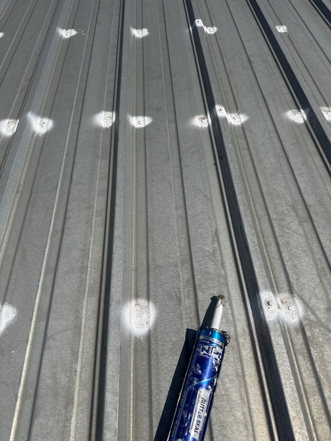 Metal Roof Fastener Replacement and Seam Sealing in West Point, NE by Crows Roofing LLC